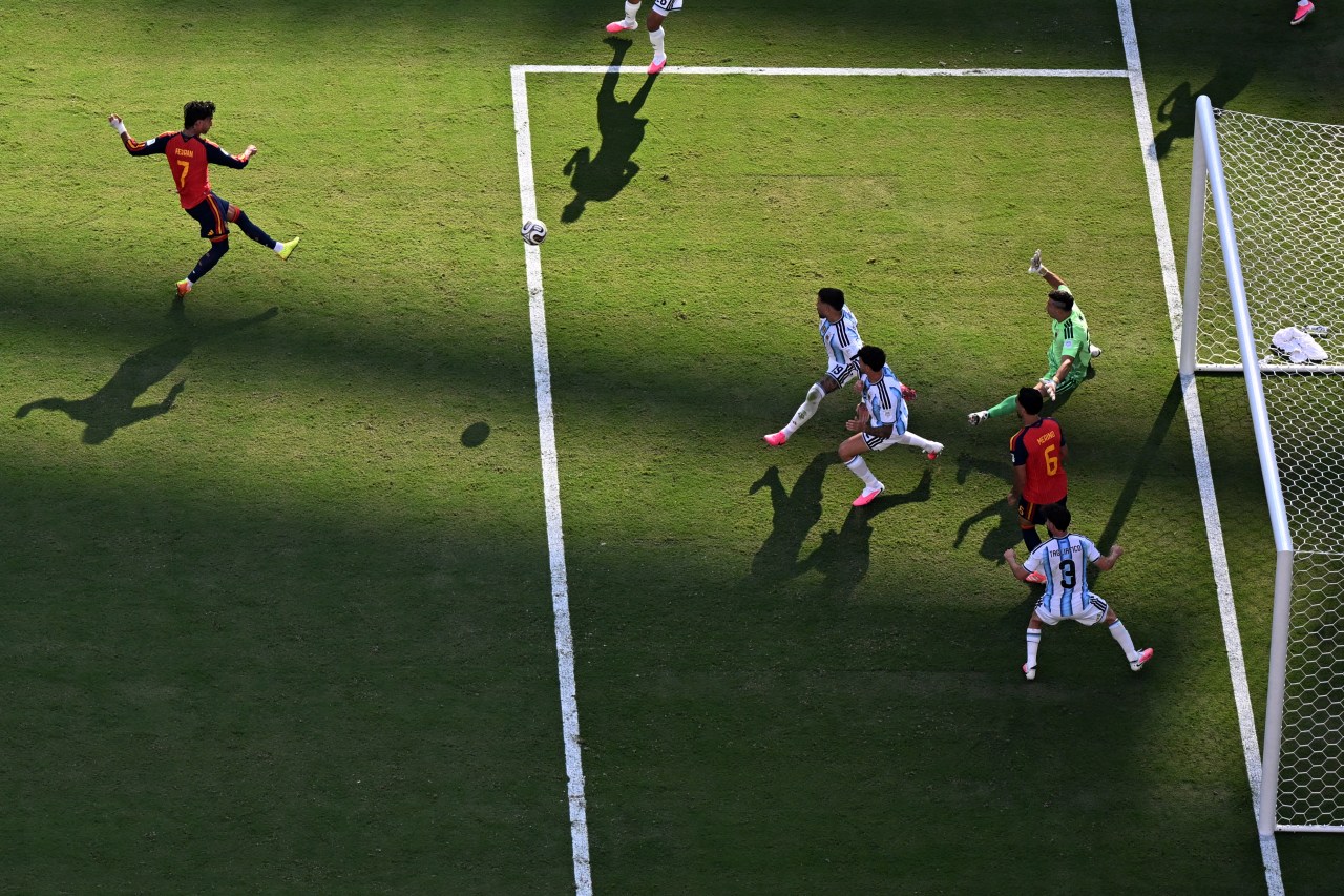 Ferran Torres scoring a goal for Spain against Argentina in the 2026 World Cup Final
