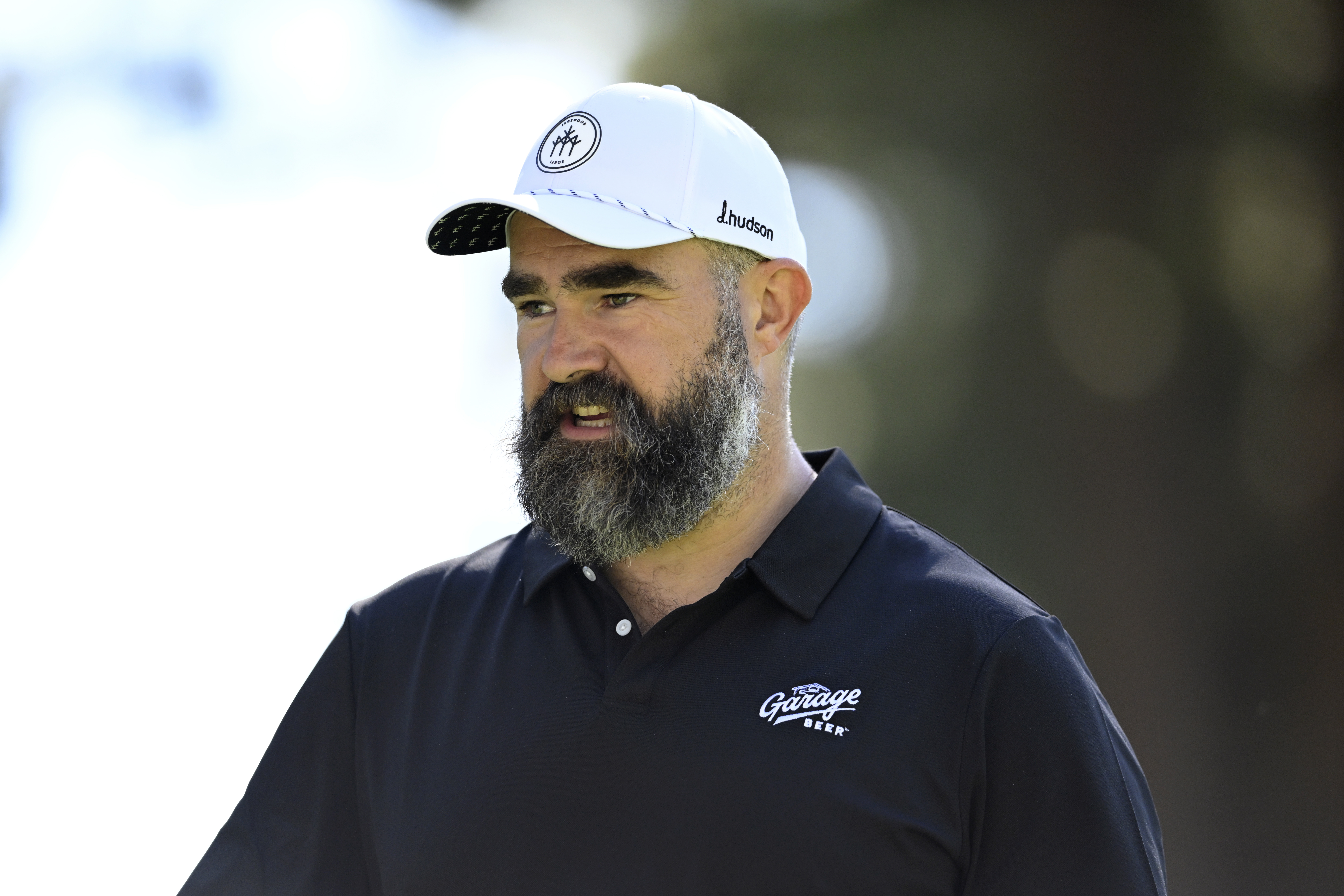 Jason Kelce standing on a golf green at Edgewood Tahoe Golf Course in Stateline, Nevada