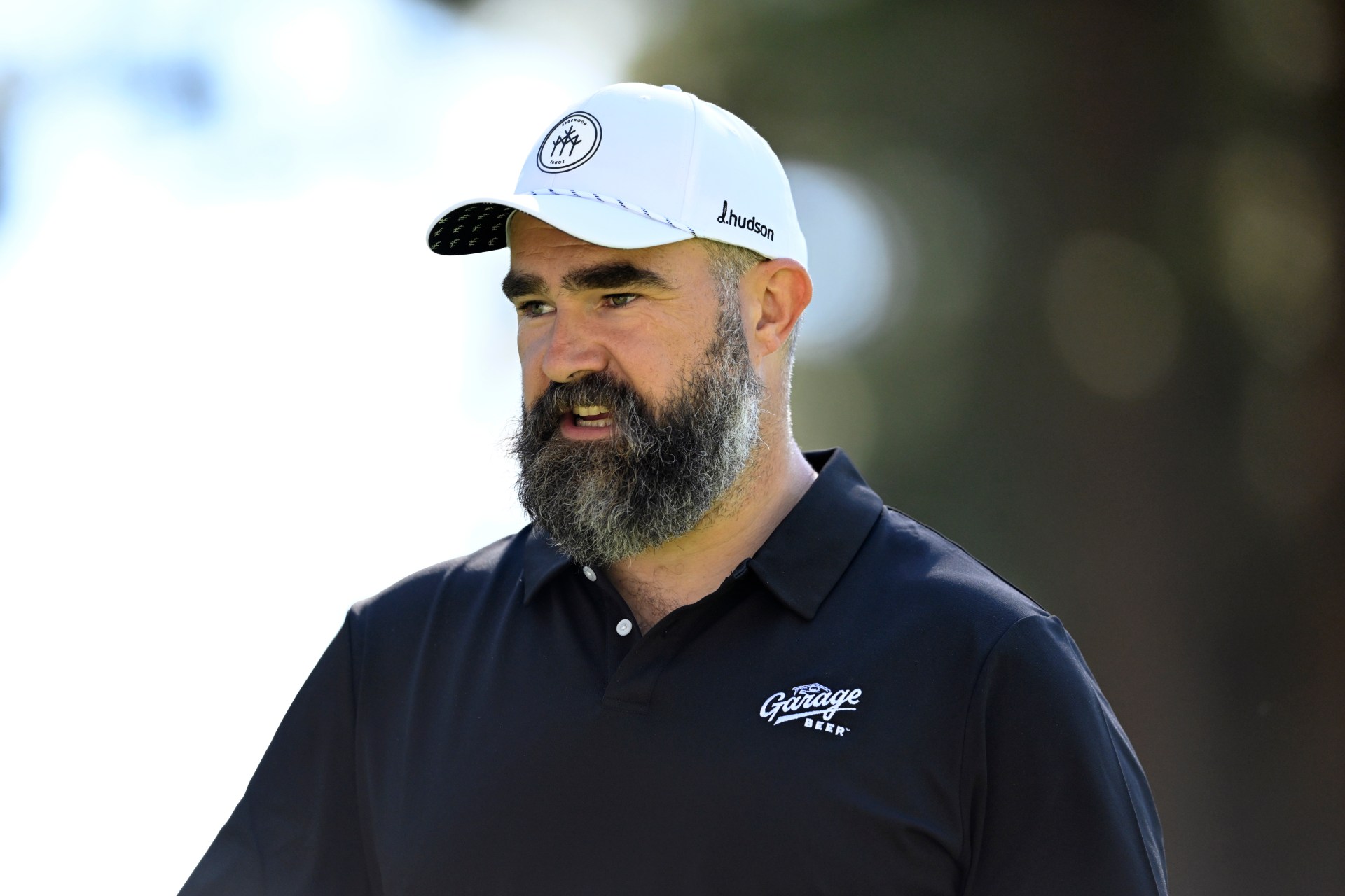 Jason Kelce standing on a golf green at Edgewood Tahoe Golf Course in Stateline, Nevada