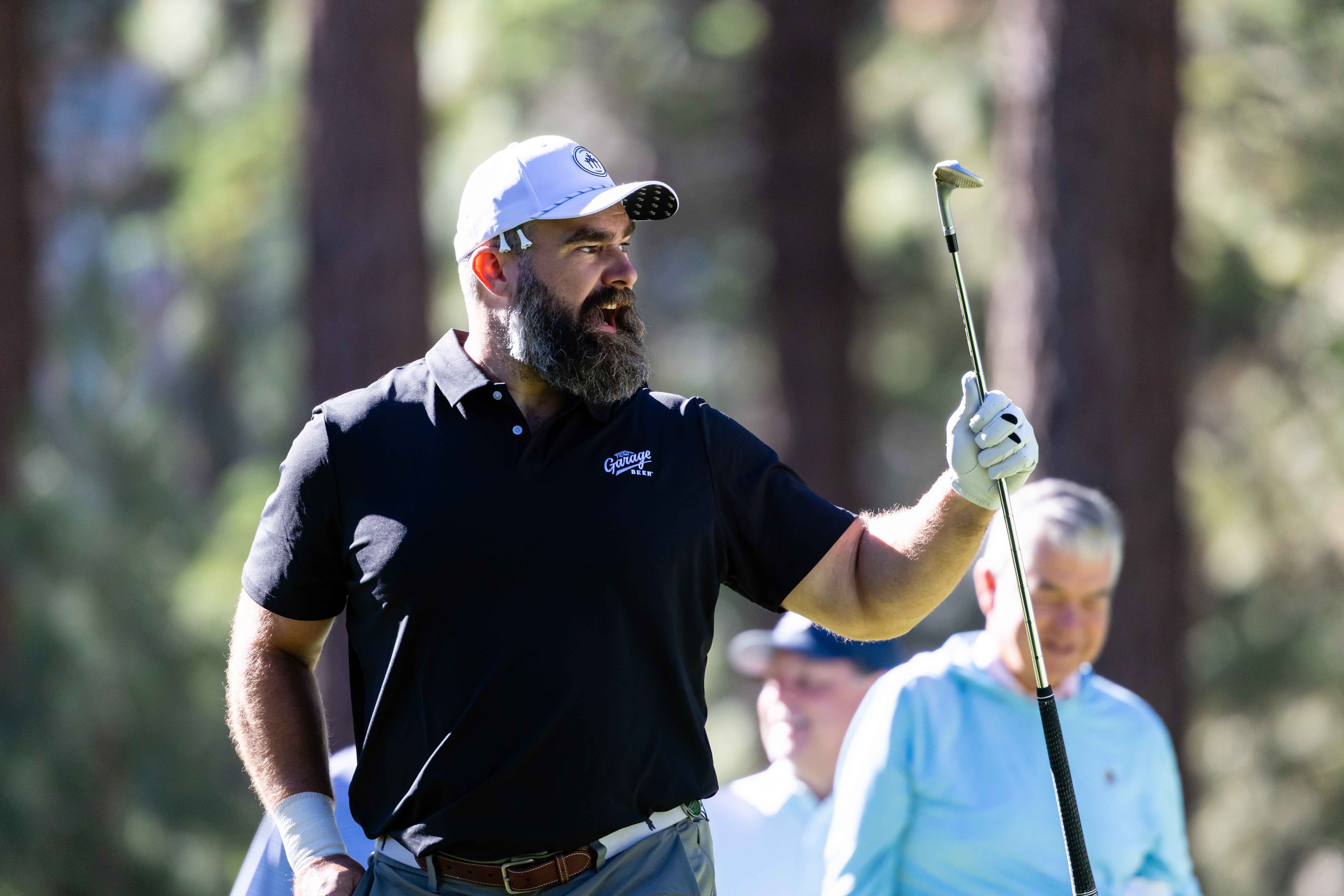 Jason Kelce interacting with fans on the golf course at the American Century Championship in Stateline, Nevada