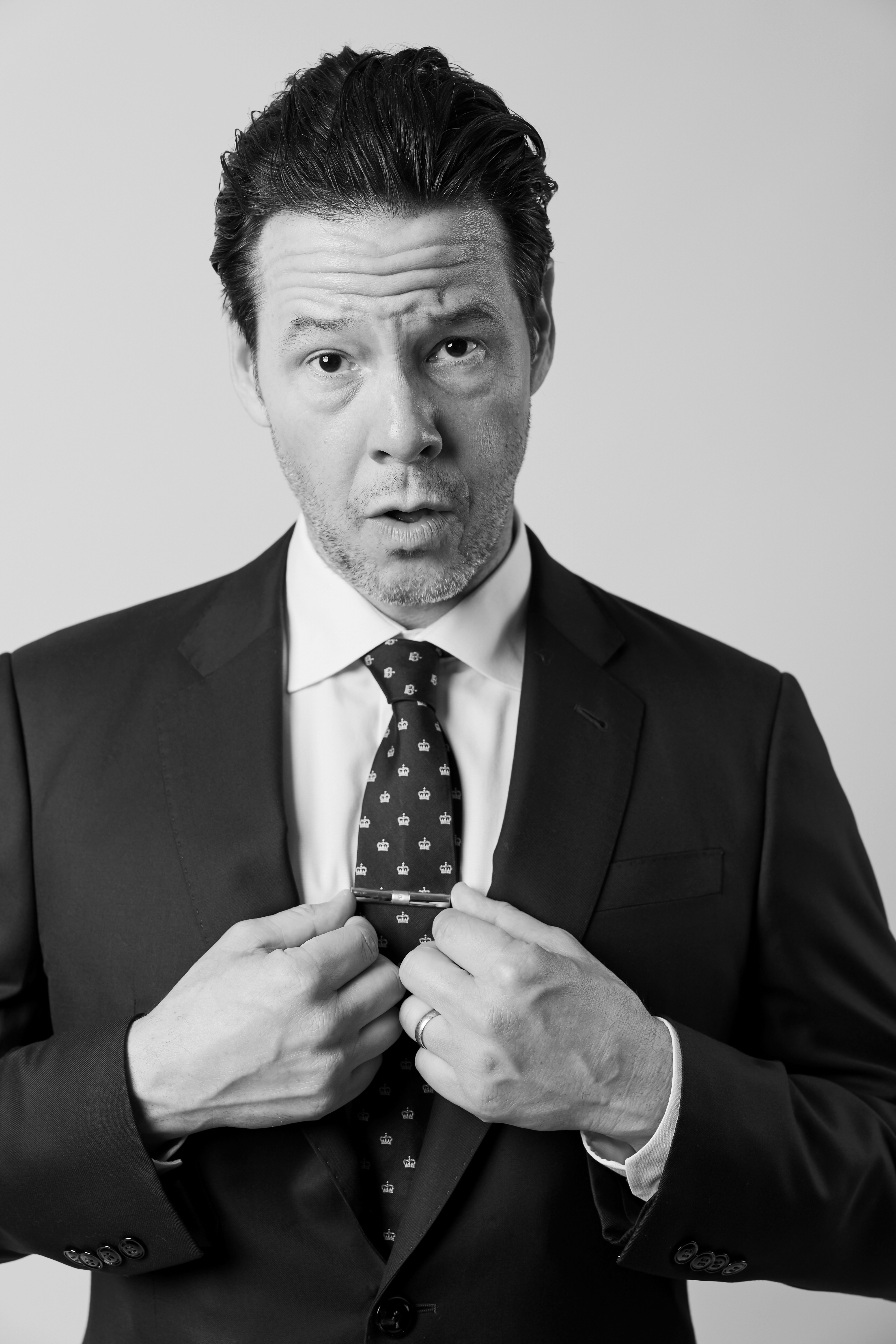 Ike Barinholtz in a black-and-white portrait at the 86th Annual Peabody Awards in Beverly Hills