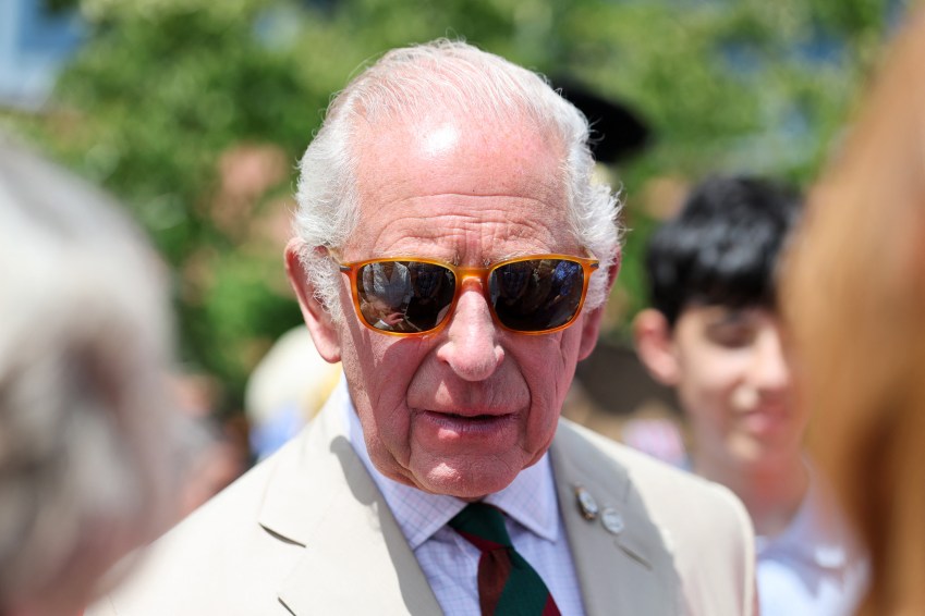 King Charles III wearing sunglasses at the Royal Tank Regiment's Families' Day at the Tank Museum in Bovington, England