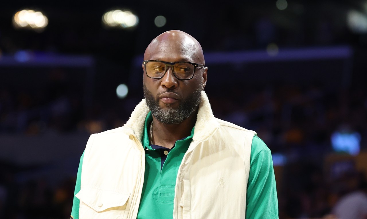 Lamar Odom seated in the stands at Crypto.com Arena during a Lakers vs. Rockets NBA playoff game