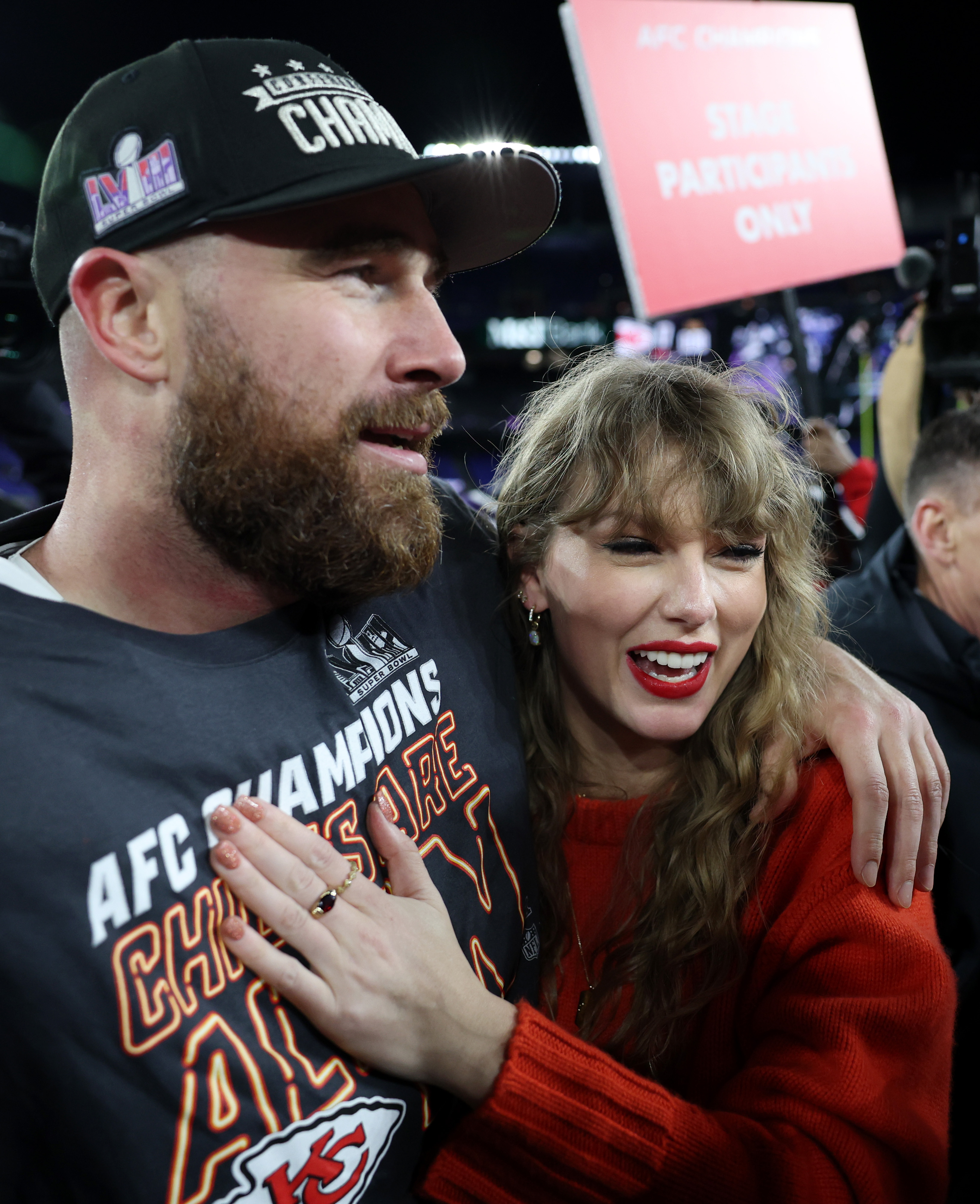 Travis Kelce and Taylor Swift celebrating together after the AFC Championship Game at M&T Bank Stadium in Baltimore