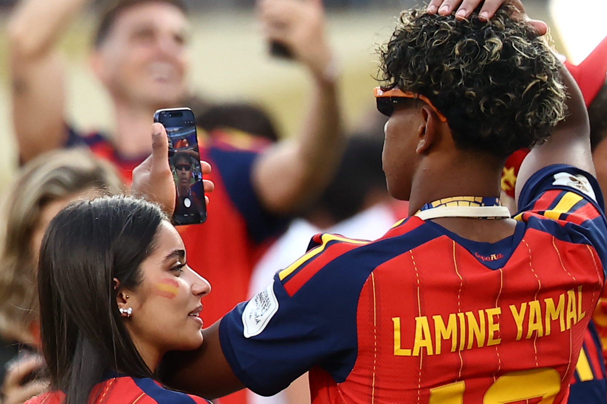 Click to open the image gallery Lamine Yamal taking a selfie with his girlfriend Inés García after Spain won the 2026 World Cup final
