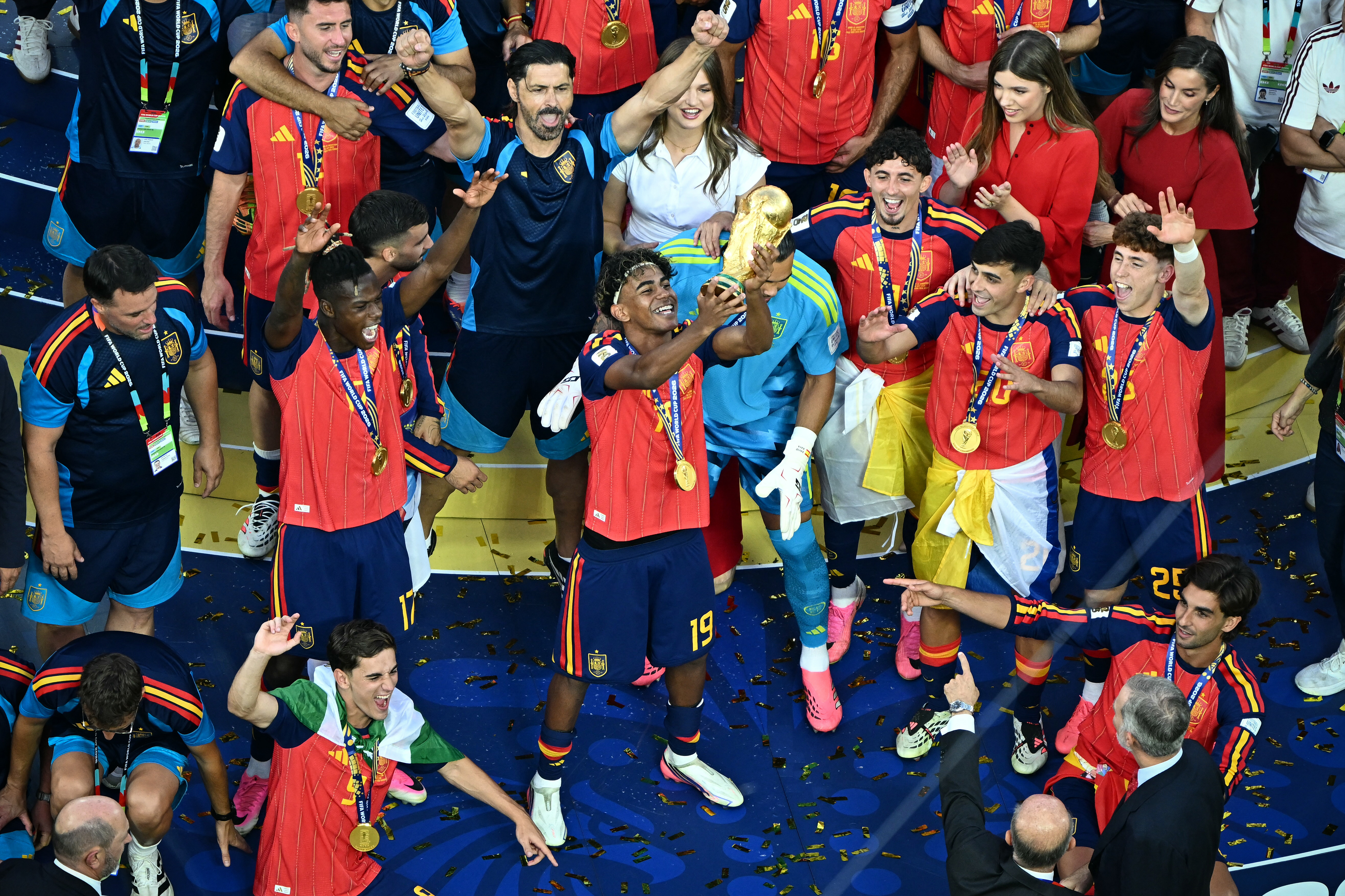 Lamine Yamal and Spain teammates lifting the FIFA World Cup trophy after beating Argentina in the 2026 final