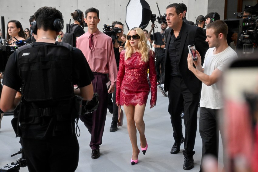 Madonna and Stuart Price seated front row at the Saint Laurent Menswear Spring/Summer 2027 Paris Fashion Week show
