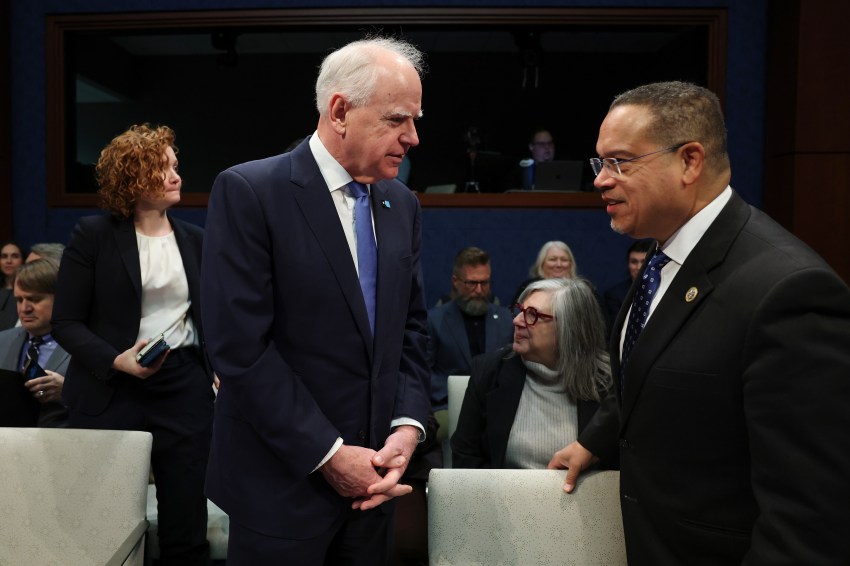 Gov. Tim Walz and AG Keith Ellison walking together at the U.S. Capitol Building in Washington, DC
