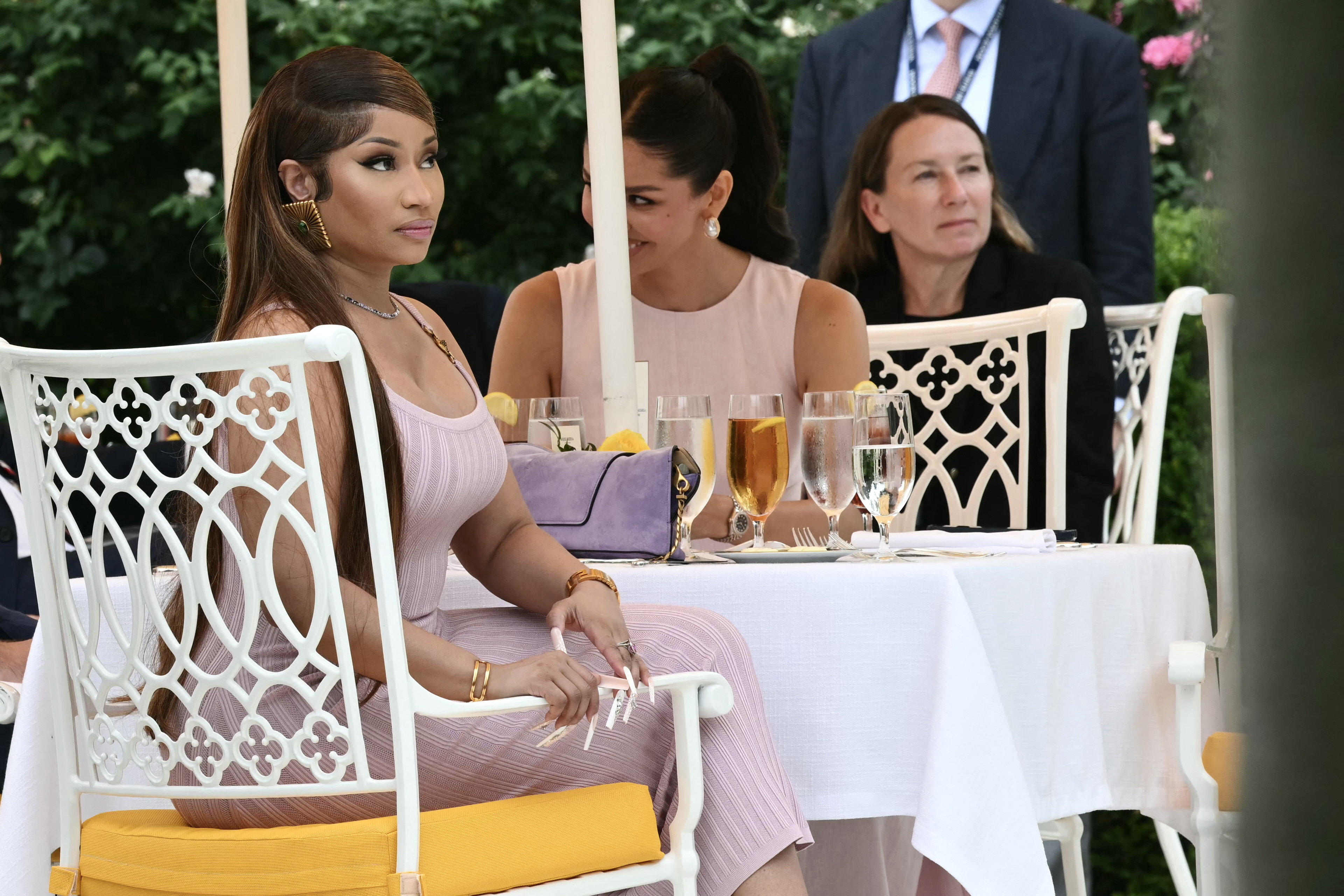 Nicki Minaj and President Donald Trump at a Rose Garden Club event on the White House lawn