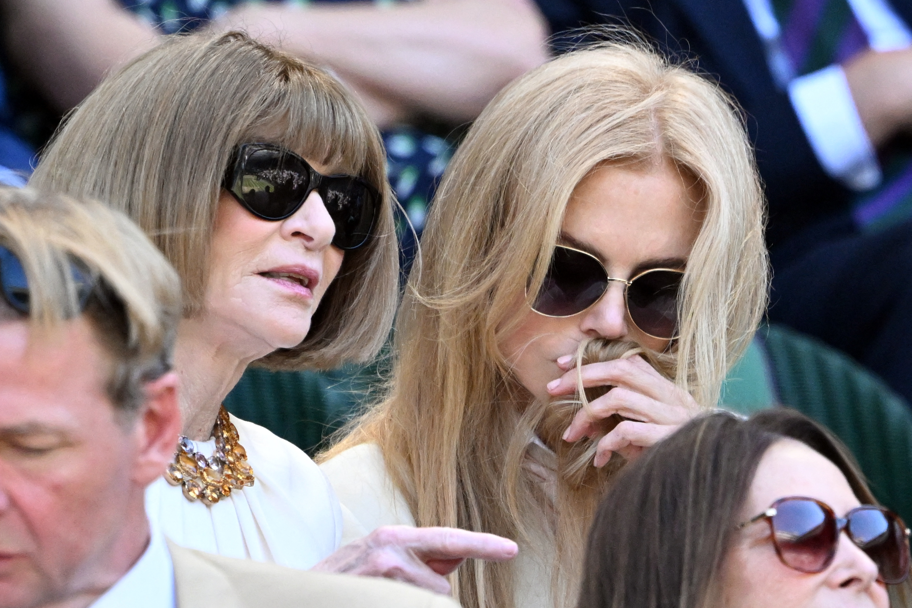 Anna Wintour and Nicole Kidman seated together in the Royal Box at Wimbledon's Centre Court