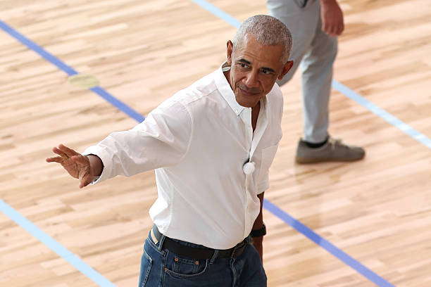 Barack Obama waving to players at the Obama Presidential Center in Chicago