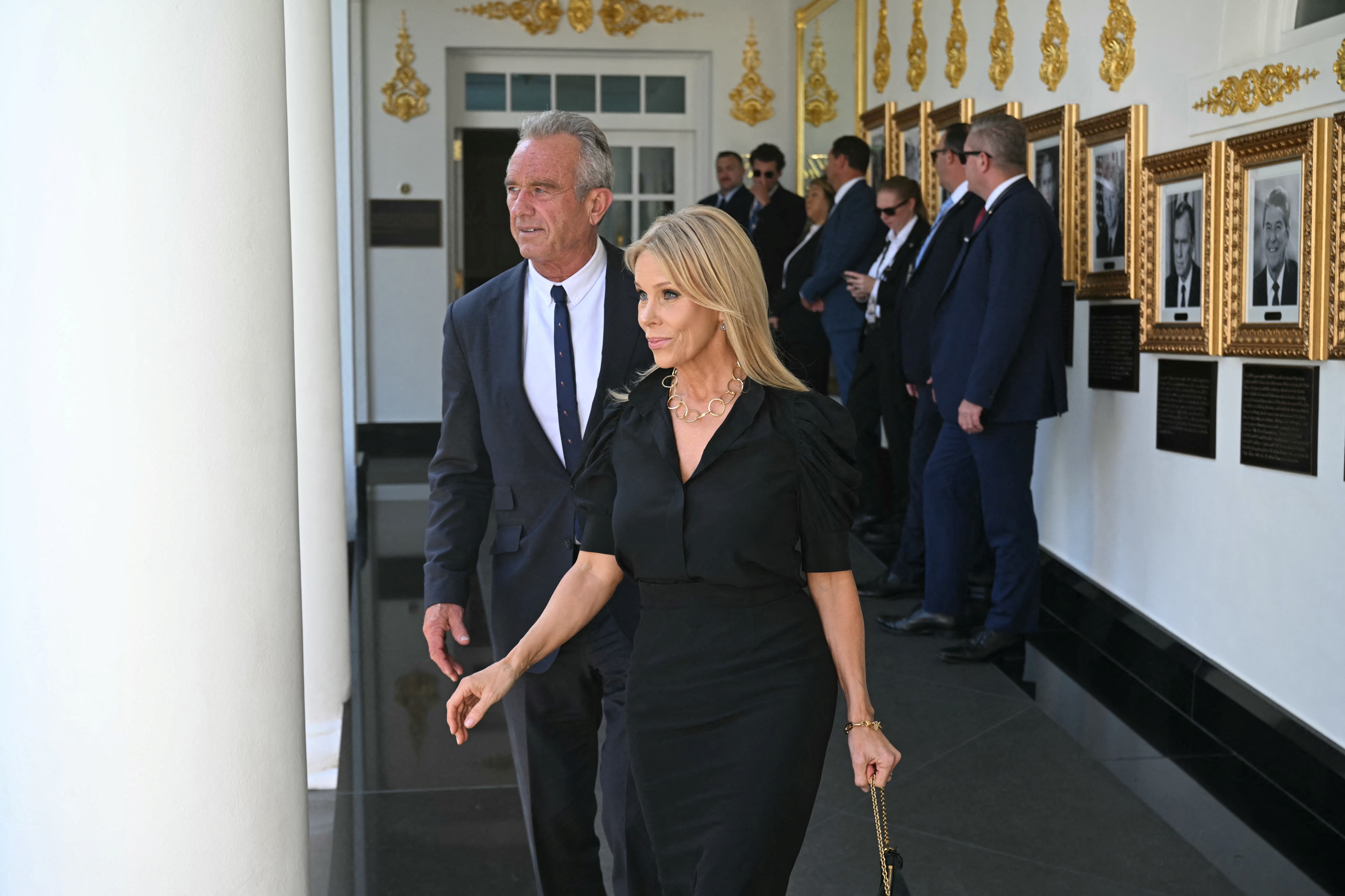 RFK Jr. and Cheryl Hines arriving at the White House Rose Garden for a Los Angeles Dodgers World Series ceremony