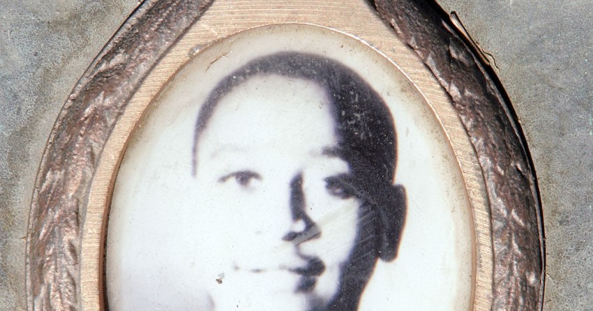 A plaque with a photo of Emmett Till at his gravesite at Burr Oak Cemetery in Alsip, Illinois
