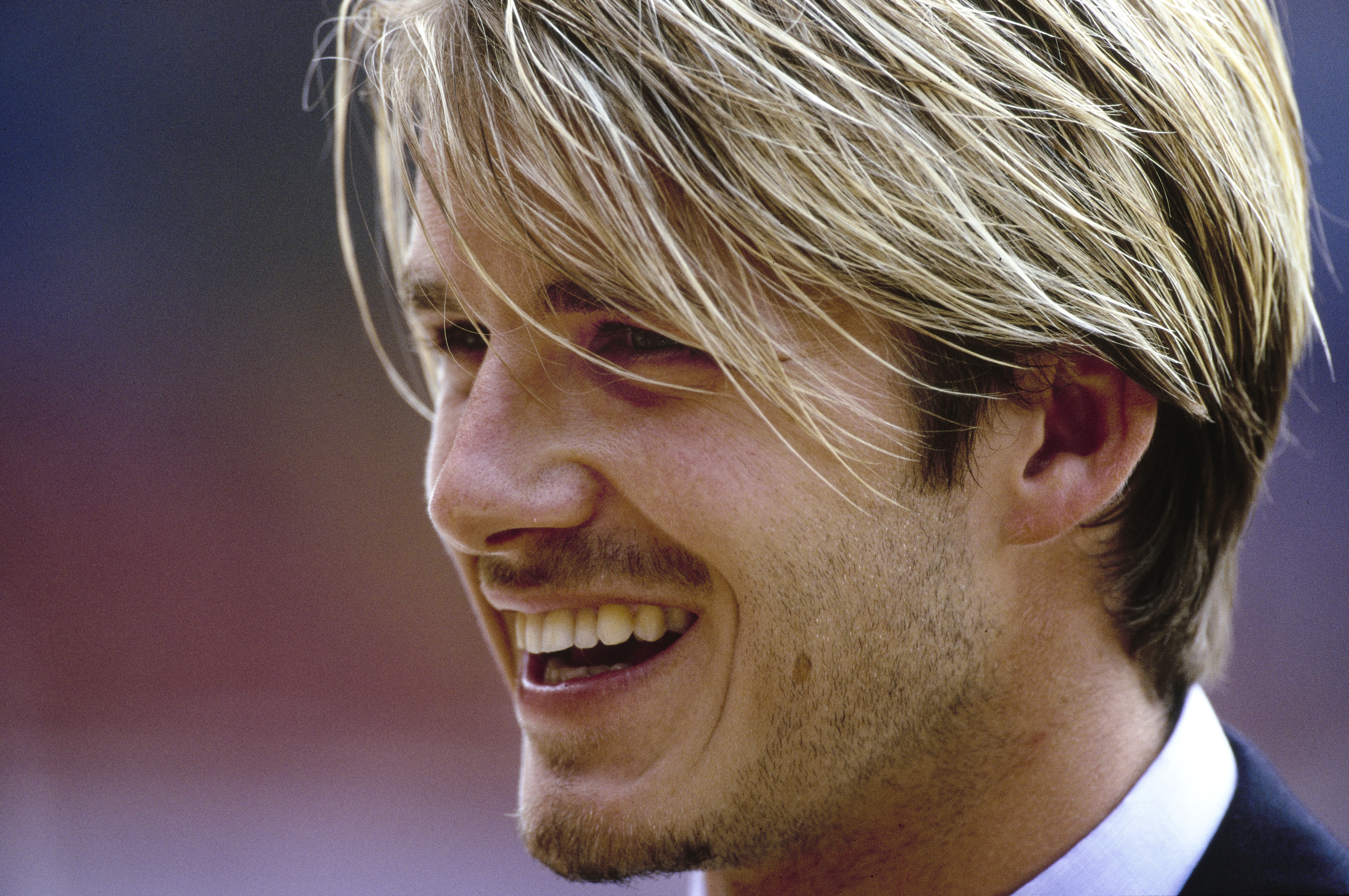David Beckham smiling at Wembley Stadium before the 1999 FA Charity Shield
