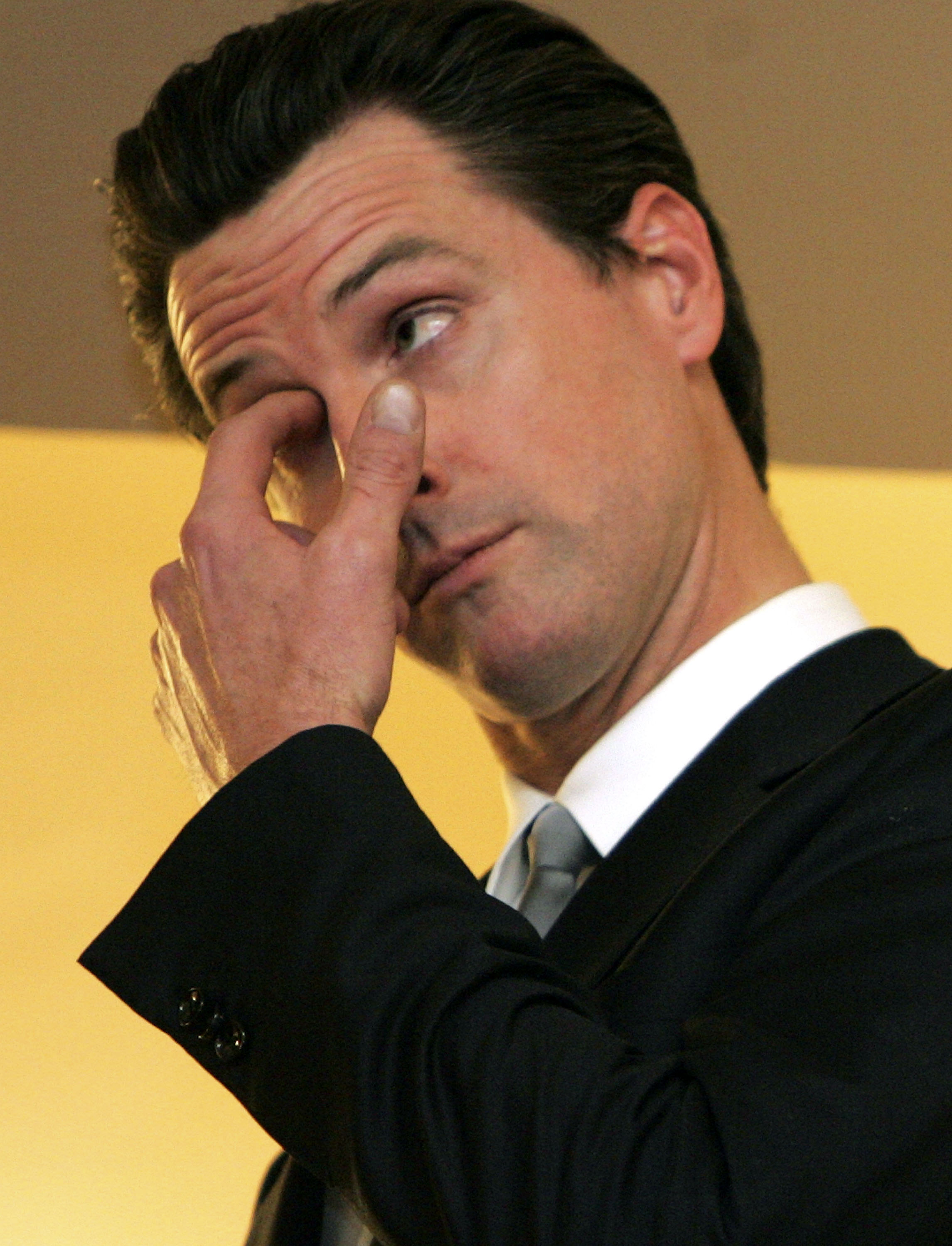 Gavin Newsom wiping his eye during a swearing-in ceremony in San Francisco in February 2007