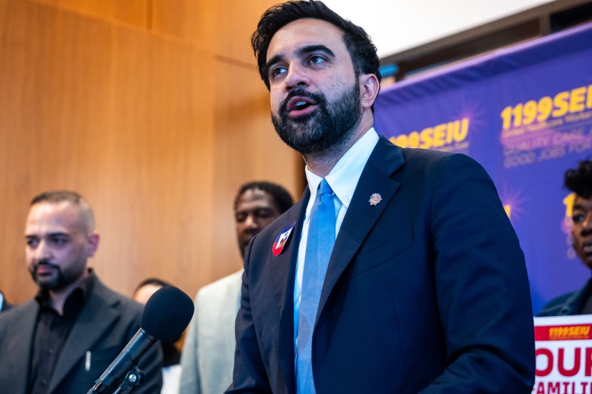 NYC Mayor Zohran Mamdani speaking at a podium during a news conference and rally at a Manhattan union headquarters