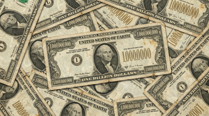 Multiple fictional one-billion-dollar bills scattered on a surface, each reading 'United States of Earth' and featuring a portrait of a founding-father-style figure.
