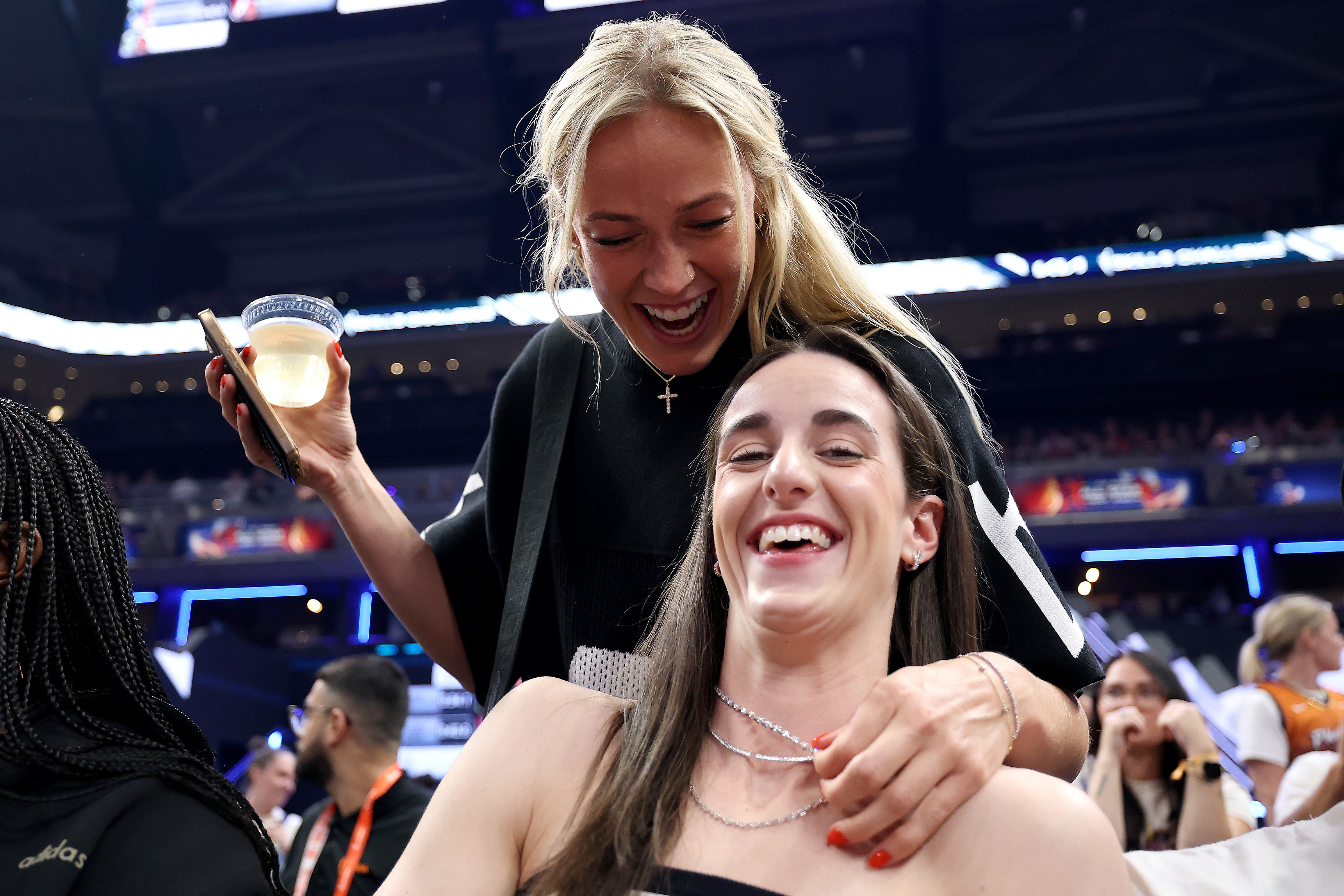 Click to open the image gallery Sophie Cunningham and Caitlin Clark of the Indiana Fever competing in the Kia WNBA Skills Challenge at Gainbridge Fieldhouse