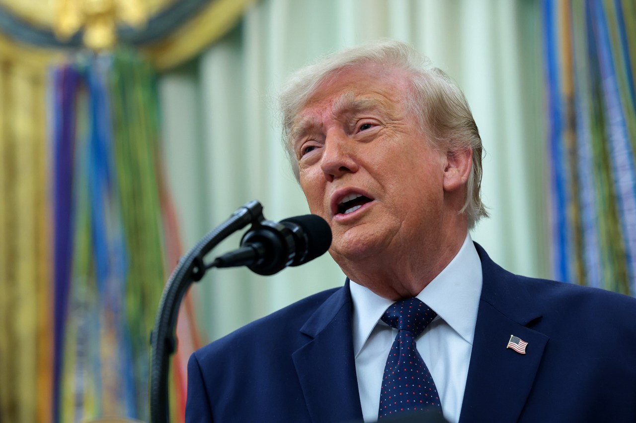 President Donald Trump speaking at the Resolute Desk in the Oval Office at the White House