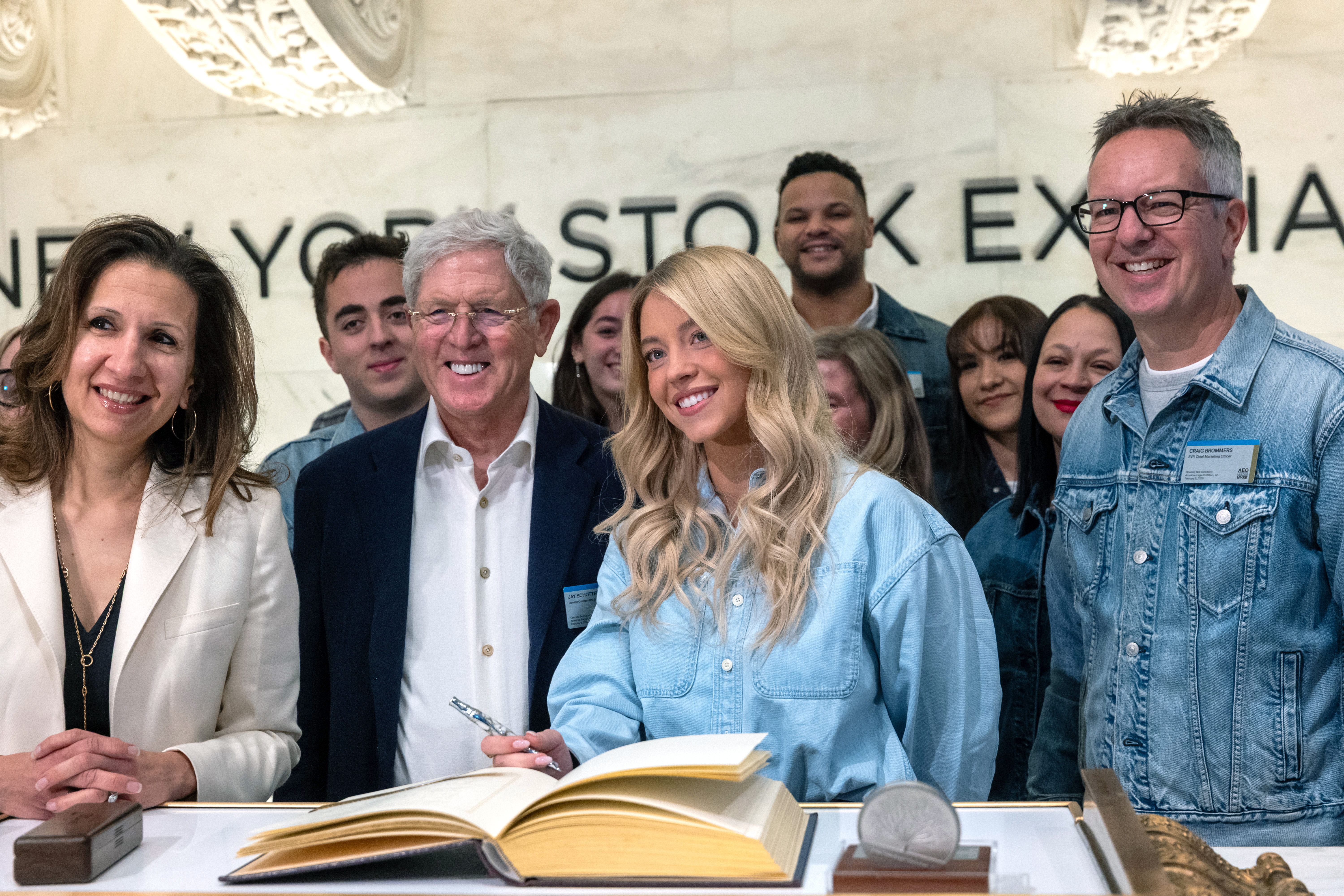 Sydney Sweeney ringing the Opening Bell at the New York Stock Exchange with American Eagle Outfitters executives