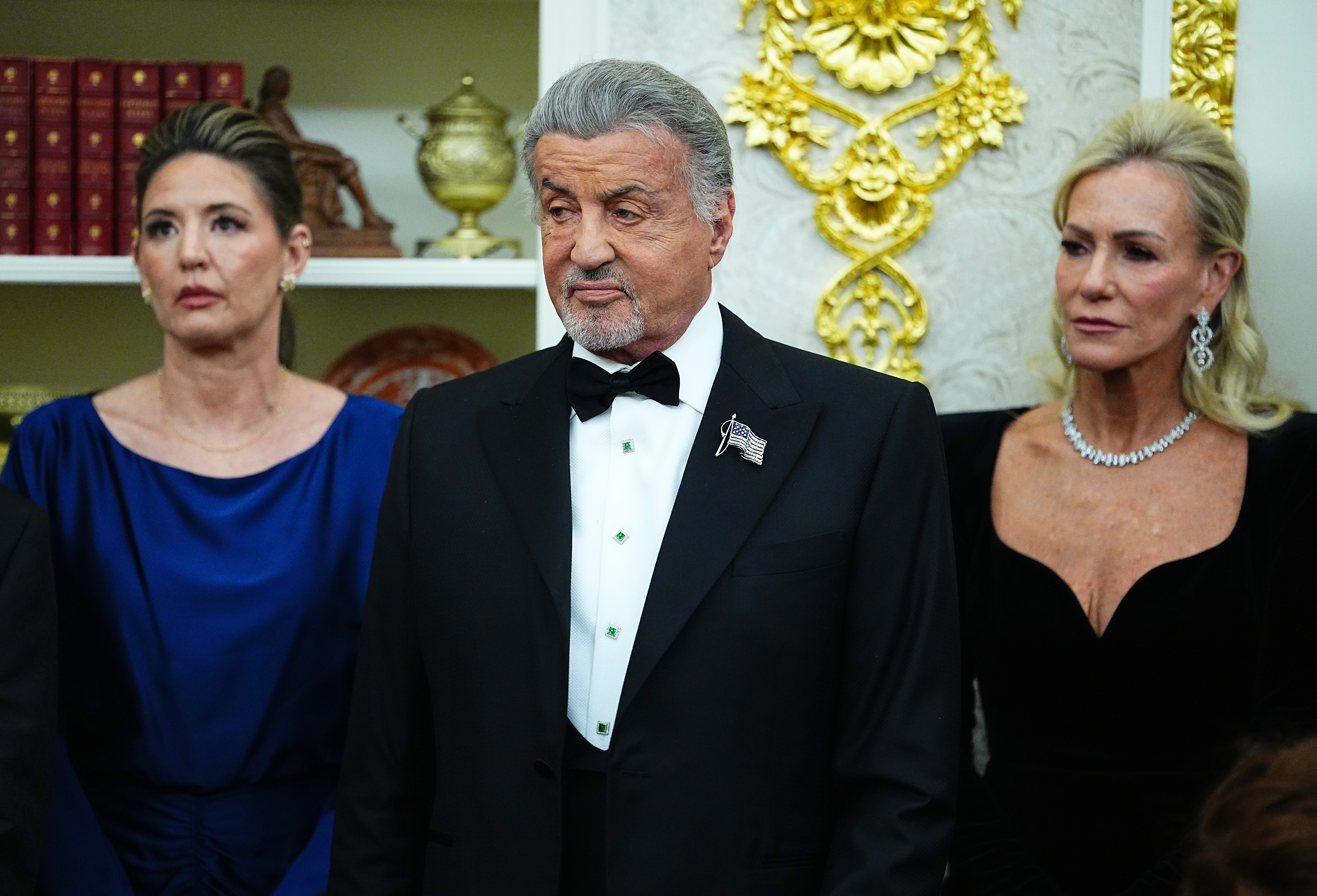 Sylvester Stallone and President Donald Trump during a medal presentation ceremony for the 2025 Kennedy Center Honorees in the Oval Office