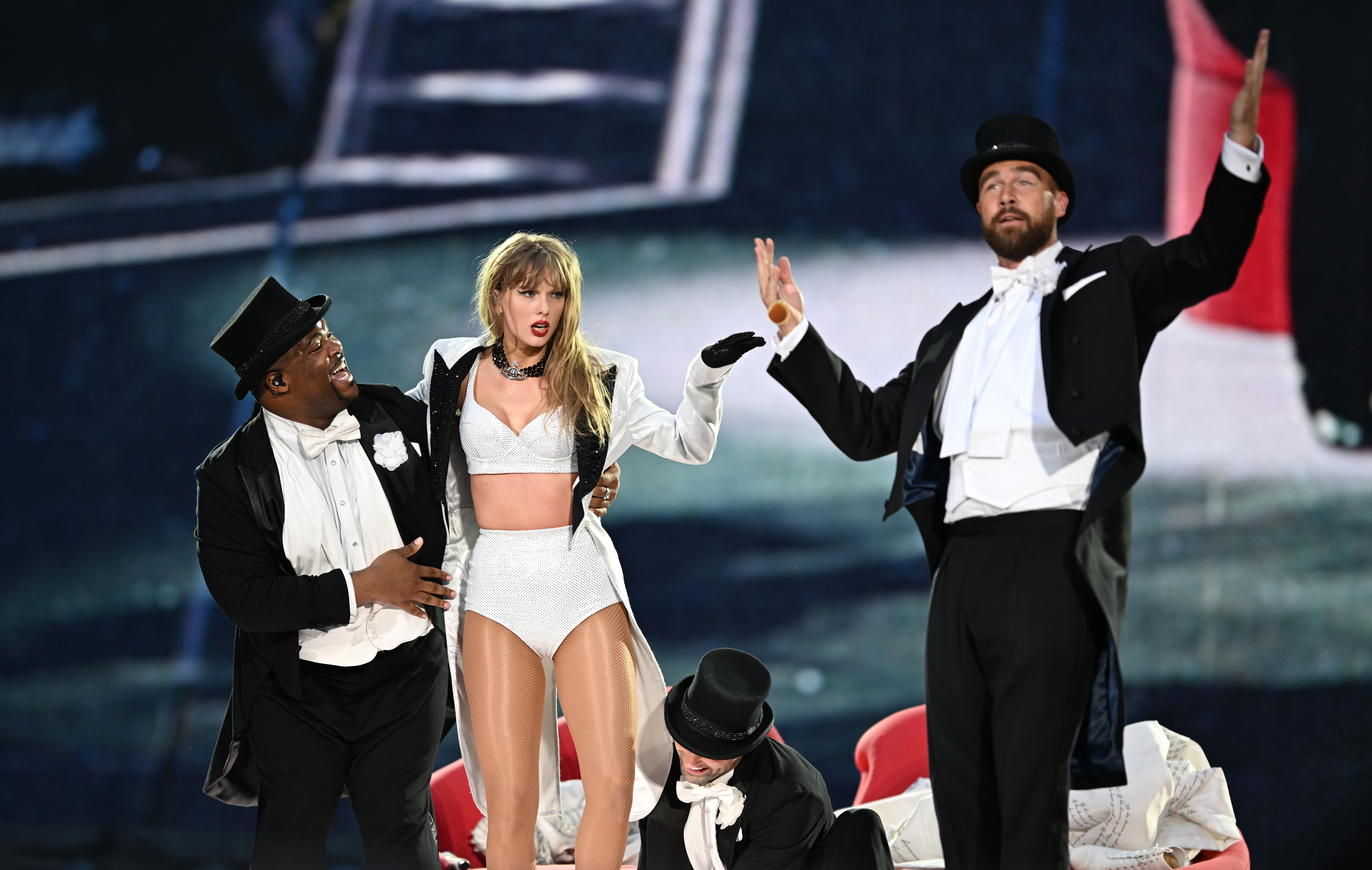 Click to open the image gallery Taylor Swift and Travis Kelce together on stage at Wembley Stadium during The Eras Tour in London