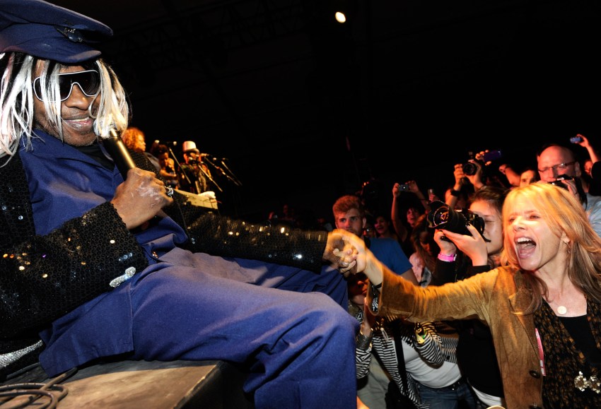 Rosanna Arquette and Sly Stone together on stage at the Coachella Valley Music & Arts Festival 2010