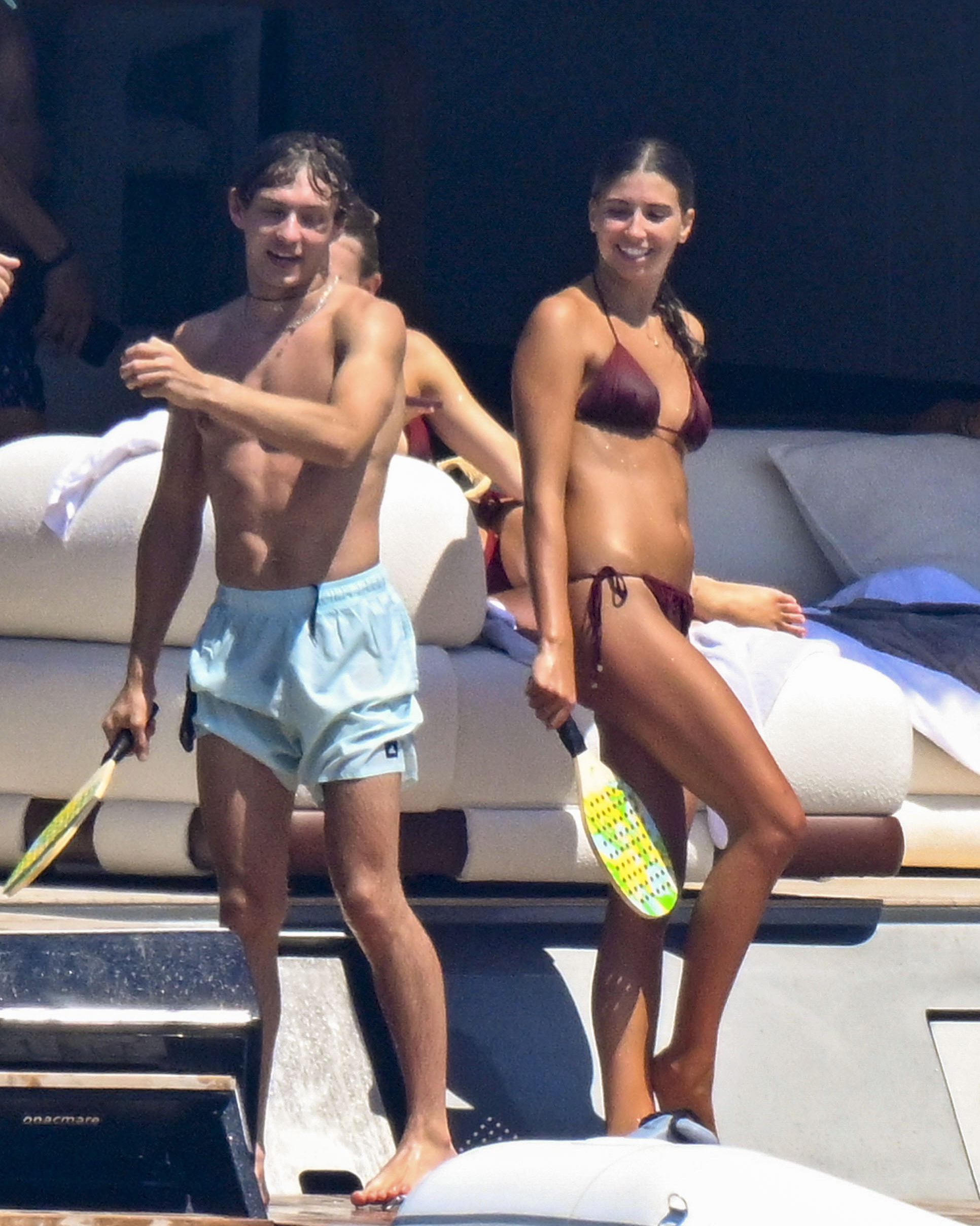 Kimi Antonelli on a luxury yacht off the coast of Sardinia with his father and an unidentified woman