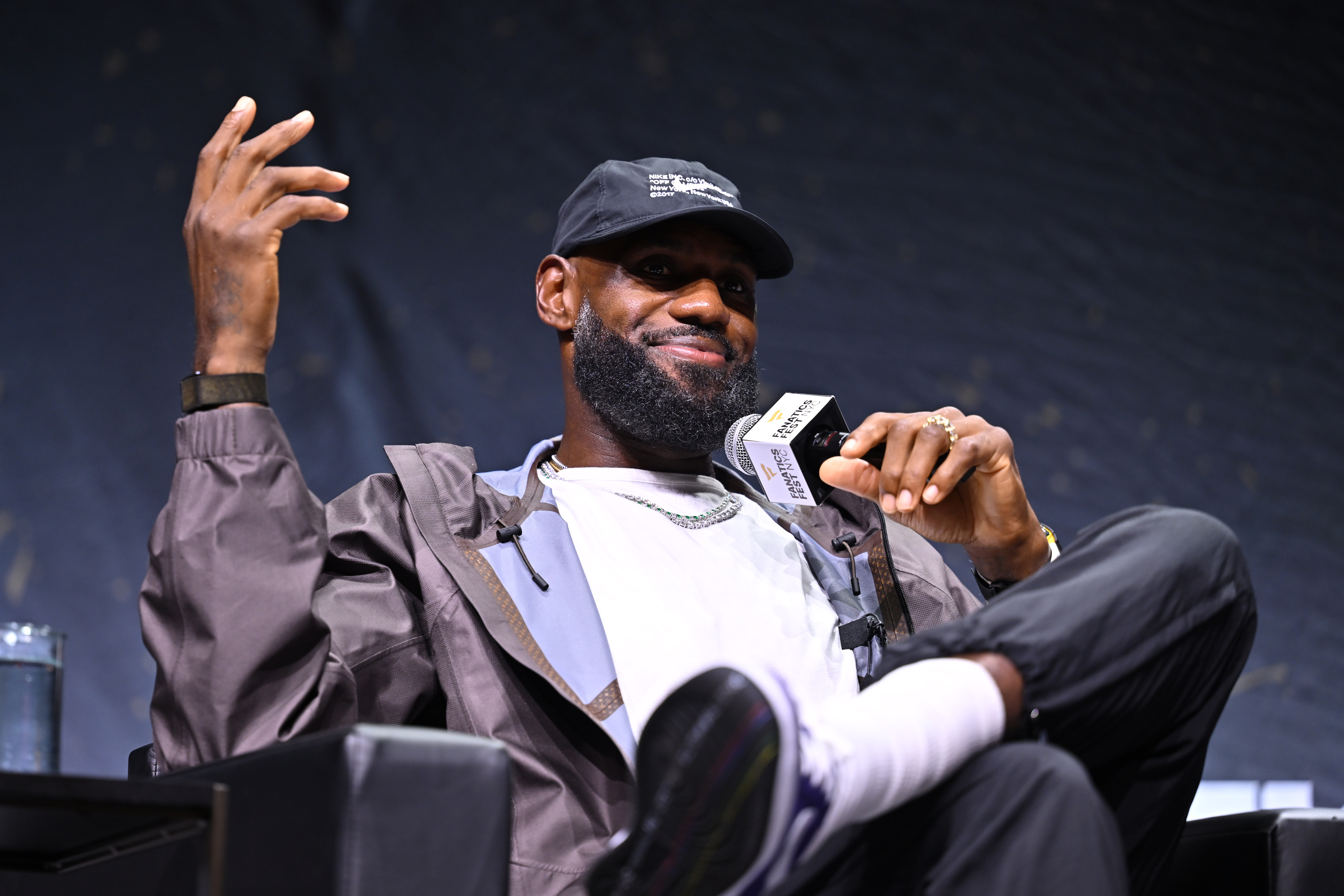 LeBron James speaking onstage at the Mind the Game panel during Fanatics Fest NYC 2026 at the Jacob Javits Center