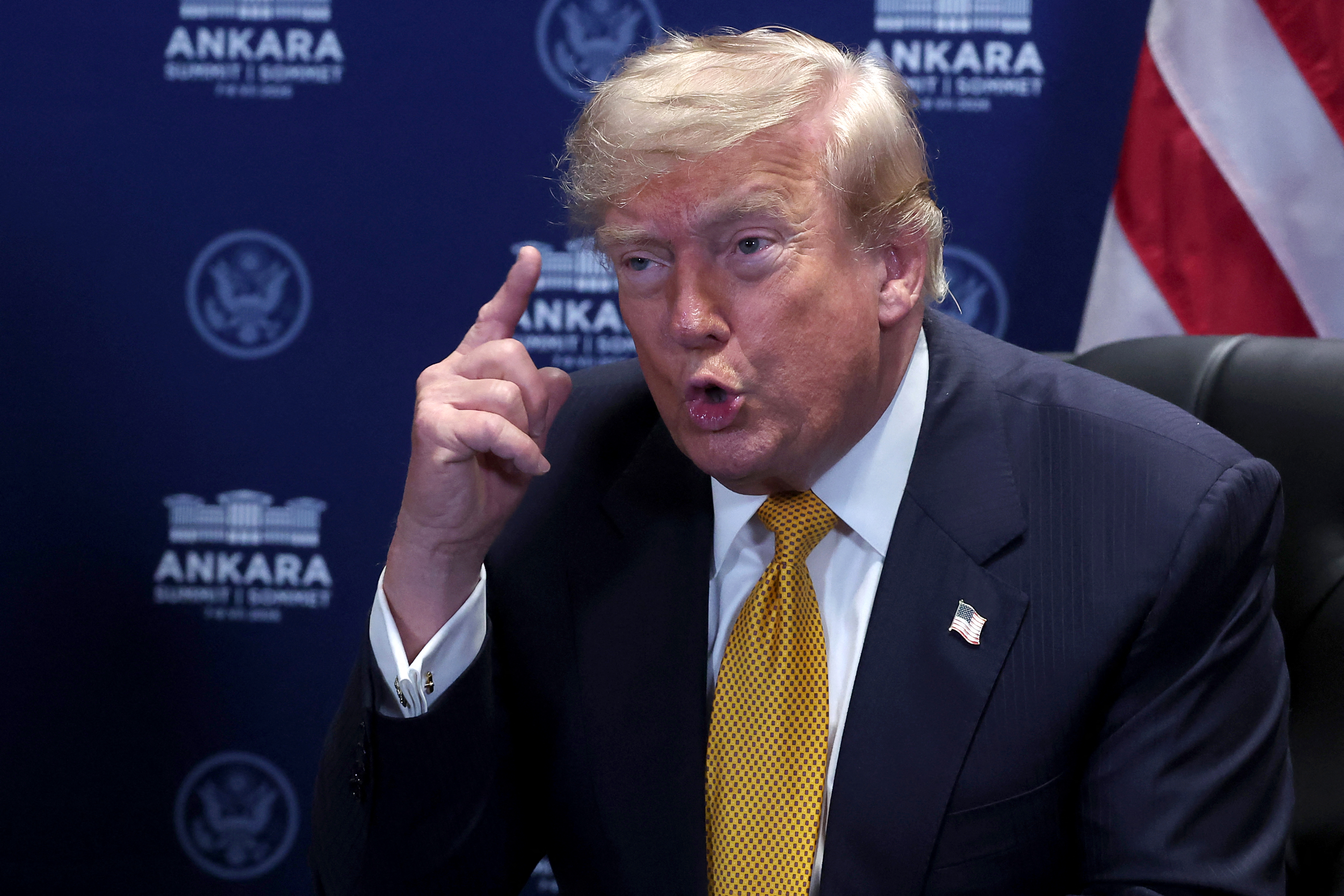 Donald Trump reacting during a meeting with the NATO Secretary General at the NATO summit in Ankara, Turkey