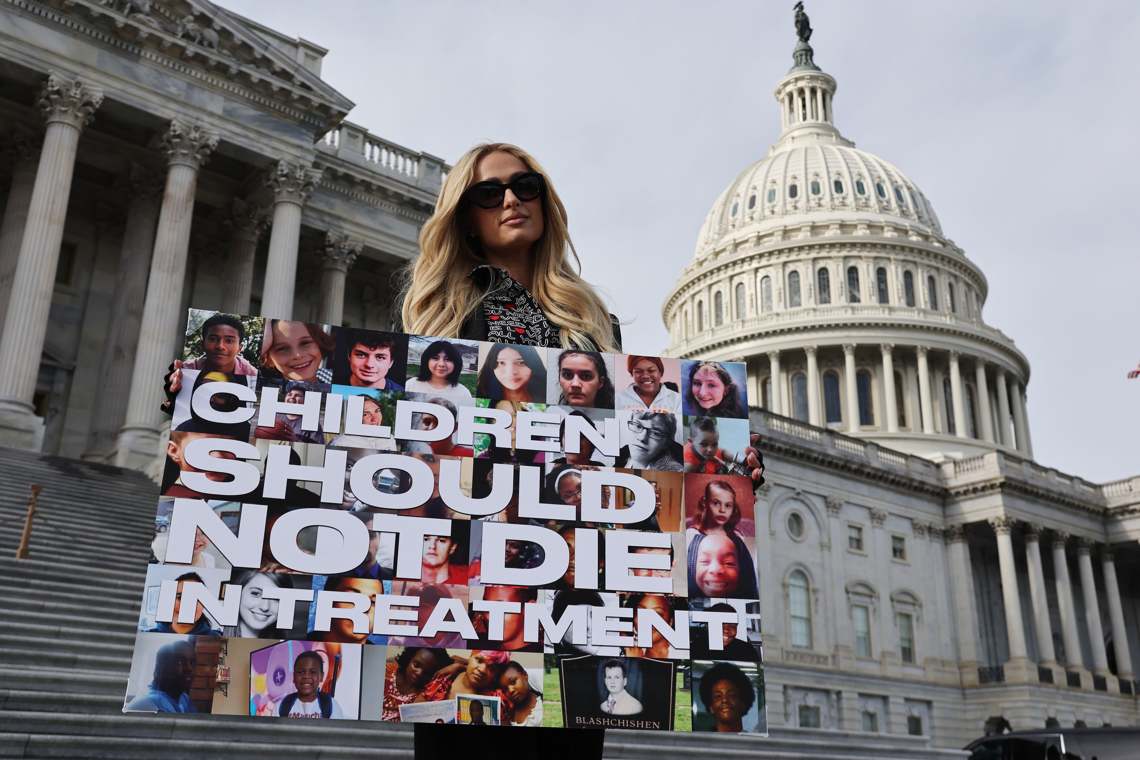 Paris Hilton posing for photos outside the U.S. Capitol building in Washington, DC