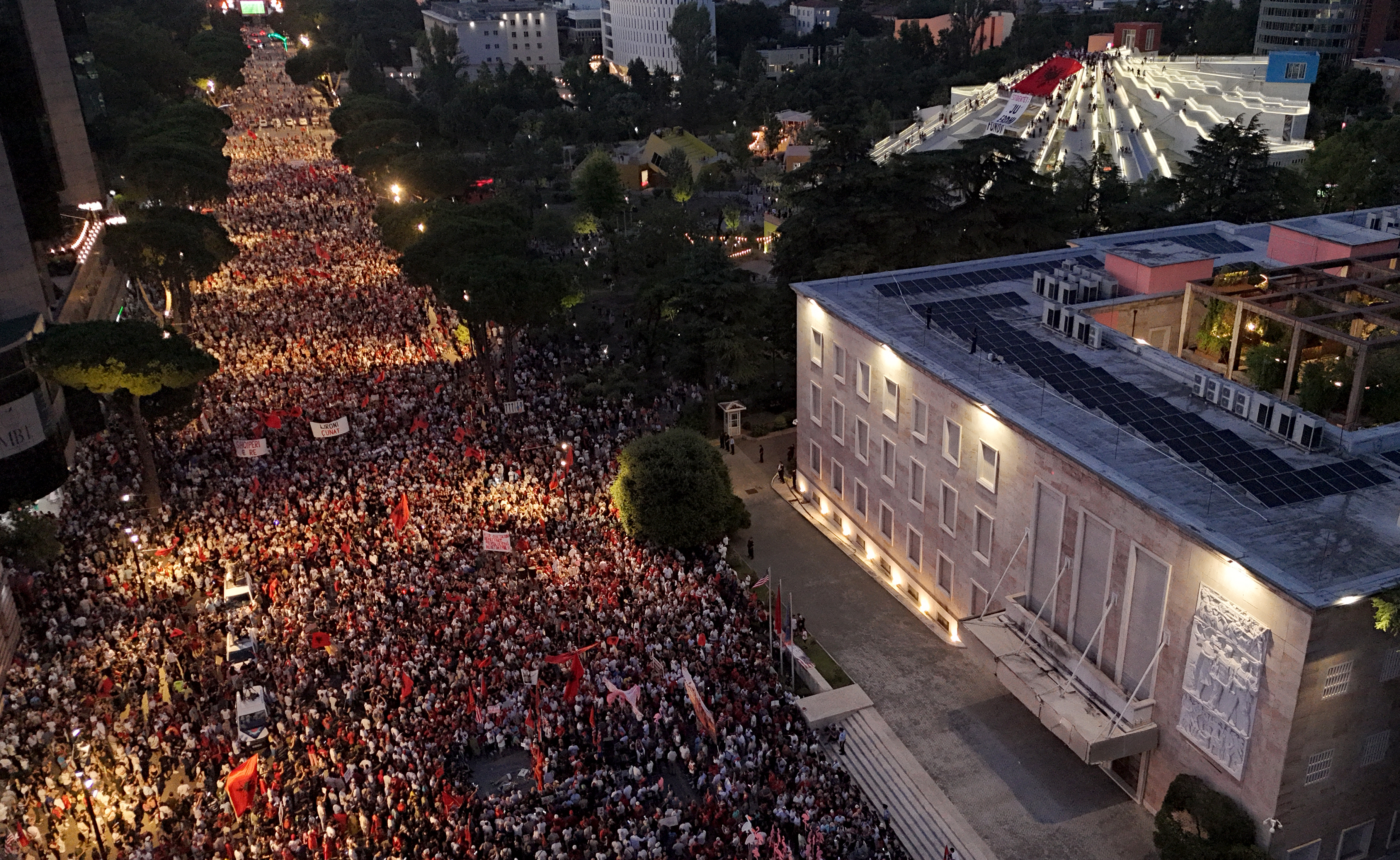 Aerial view of protesters gathered in front of the Albanian Prime Minister's Office in Tirana opposing a luxury resort construction project