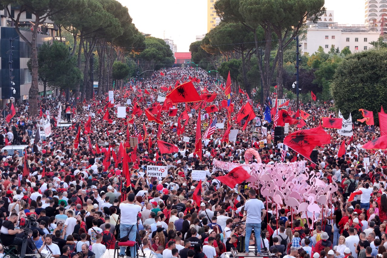 Aerial view of thousands of protesters gathered in front of Albania's Prime Minister's Office in Tirana