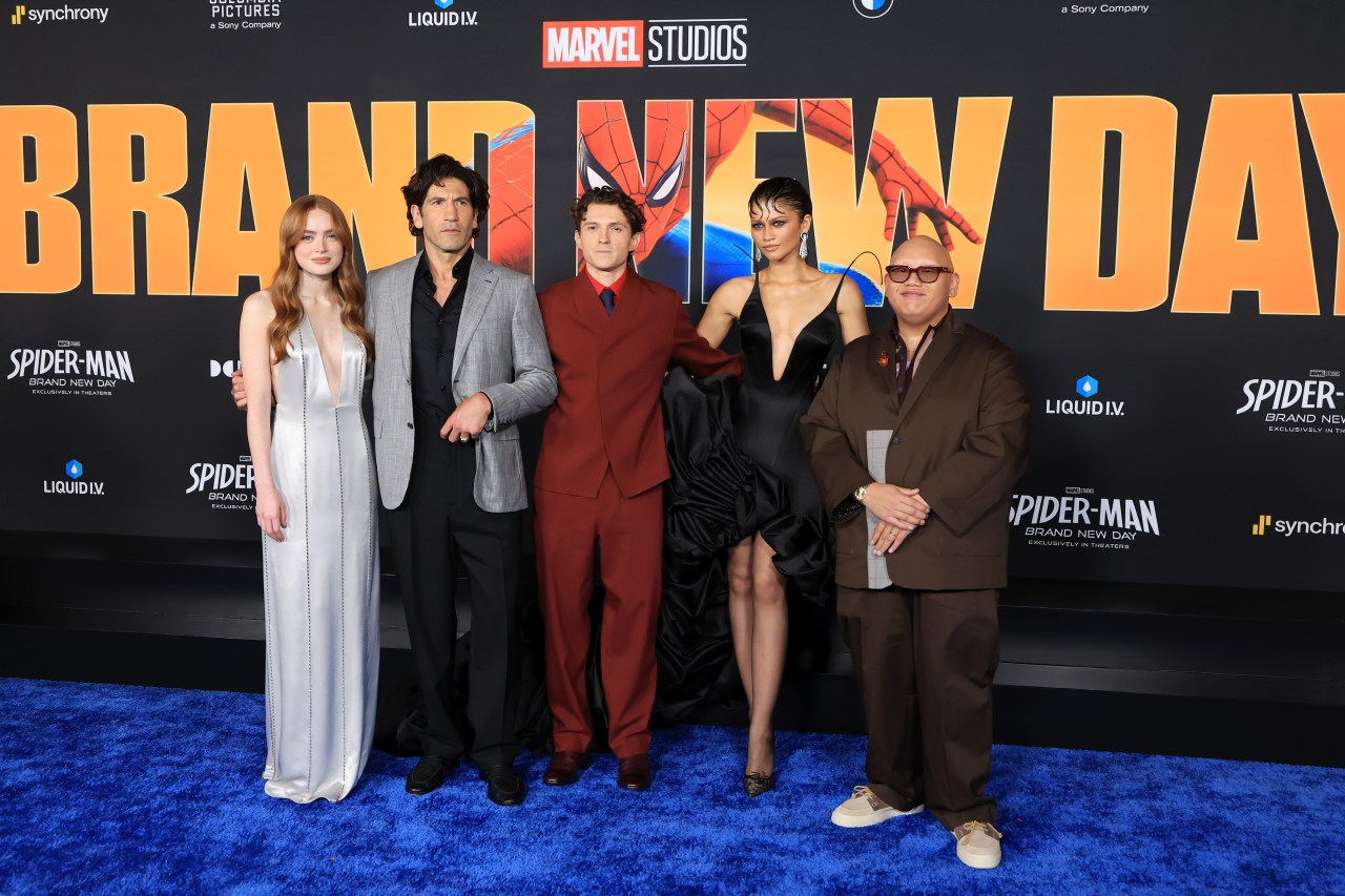 Sadie Sink, Jon Bernthal, Tom Holland, Zendaya, and Jacob Batalon pose together on the blue carpet at the Spider-Man: Brand New Day premiere.