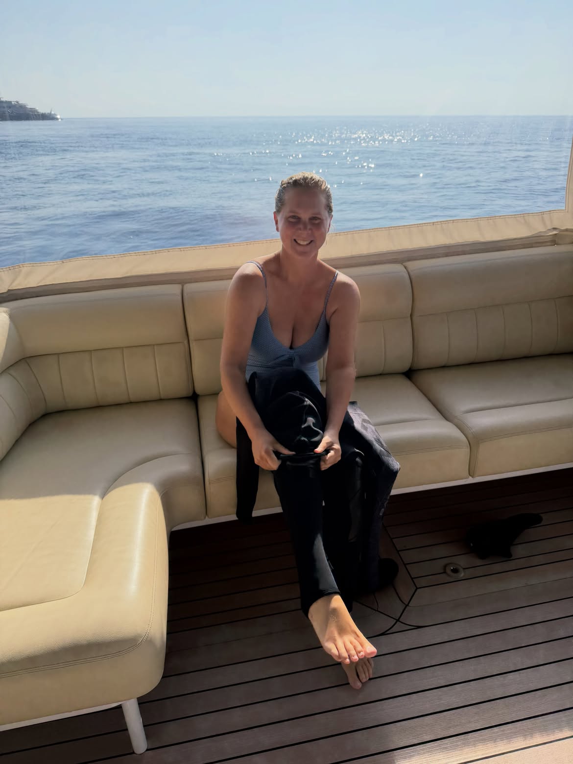 Amy Schumer in a bikini on a boat during a vacation day