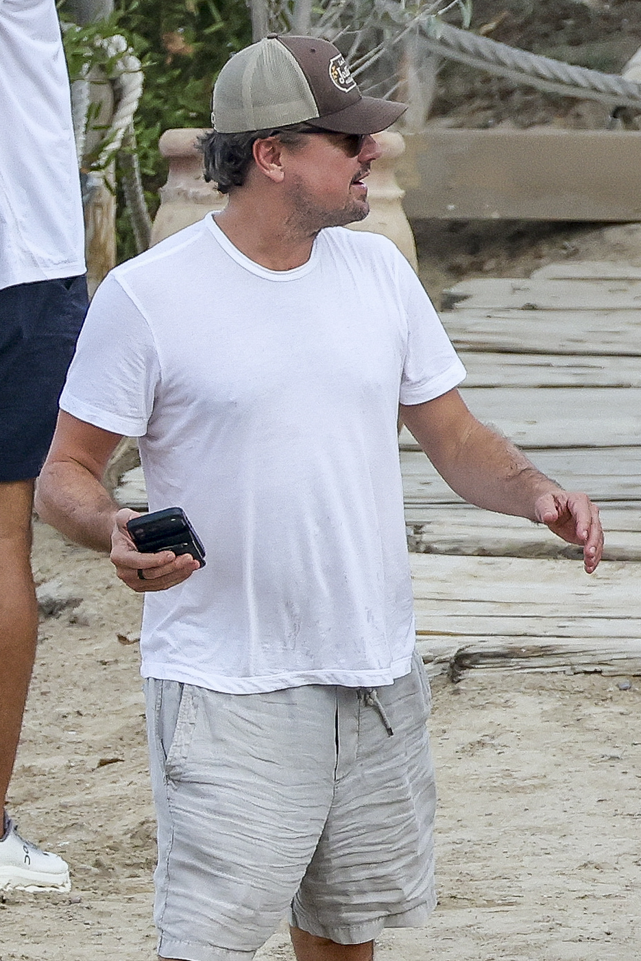 Leonardo DiCaprio and Vittoria Ceretti leaving El Chiringuito restaurant in Ibiza with friends