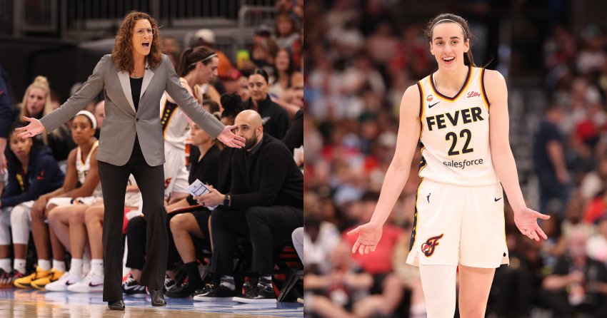 Indiana Fever head coach Stephanie White stands on the sideline with arms spread wide, reacting in frustration during a game at United Center in Chicago.