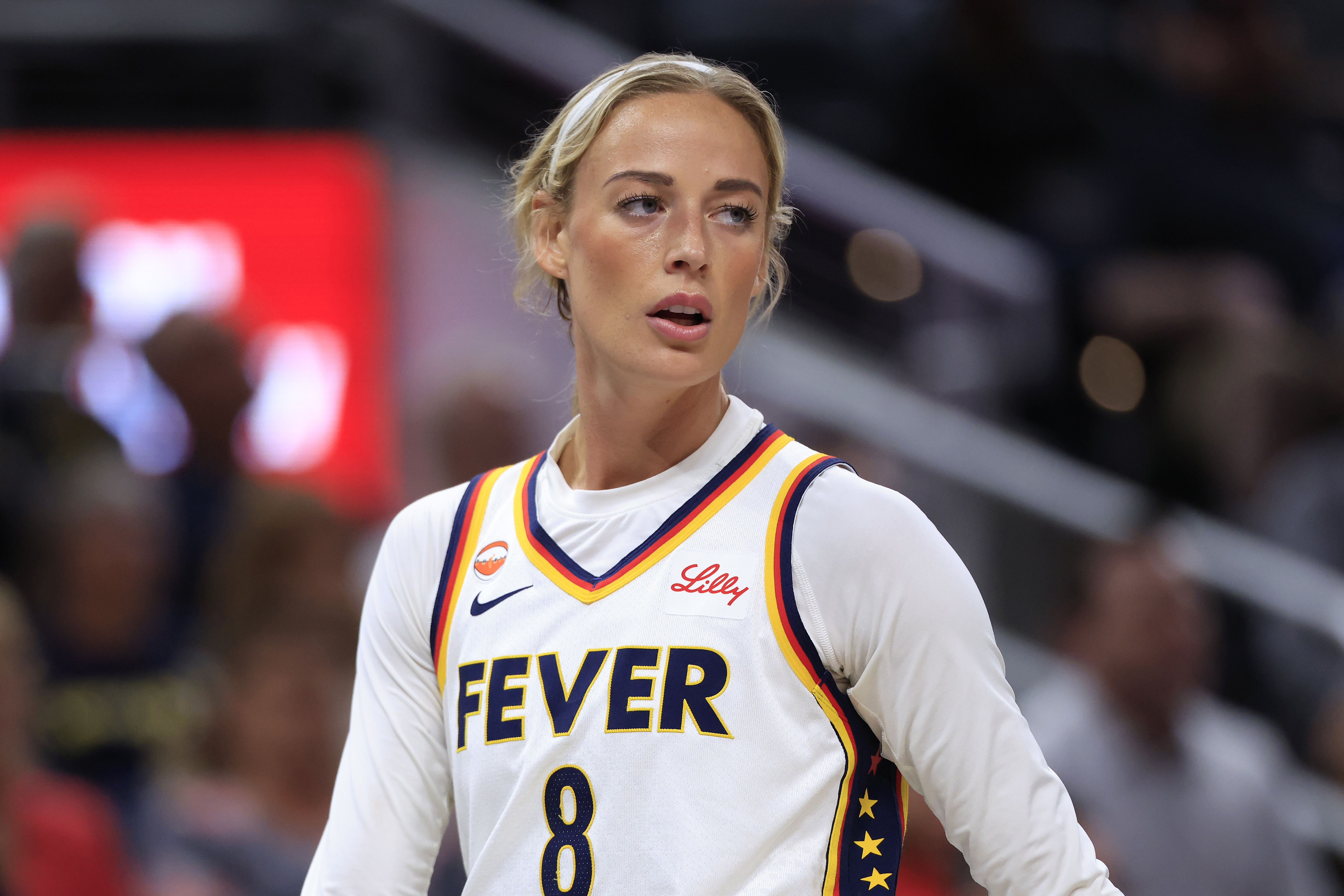 Sophie Cunningham #8 of the Indiana Fever looking on during a game against the New York Liberty at Gainbridge Fieldhouse
