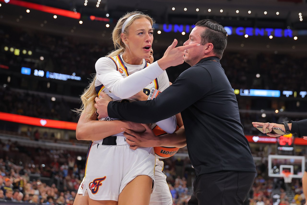 Sophie Cunningham reacting to a foul by DiJonai Carrington during an Indiana Fever vs. Chicago Sky WNBA game