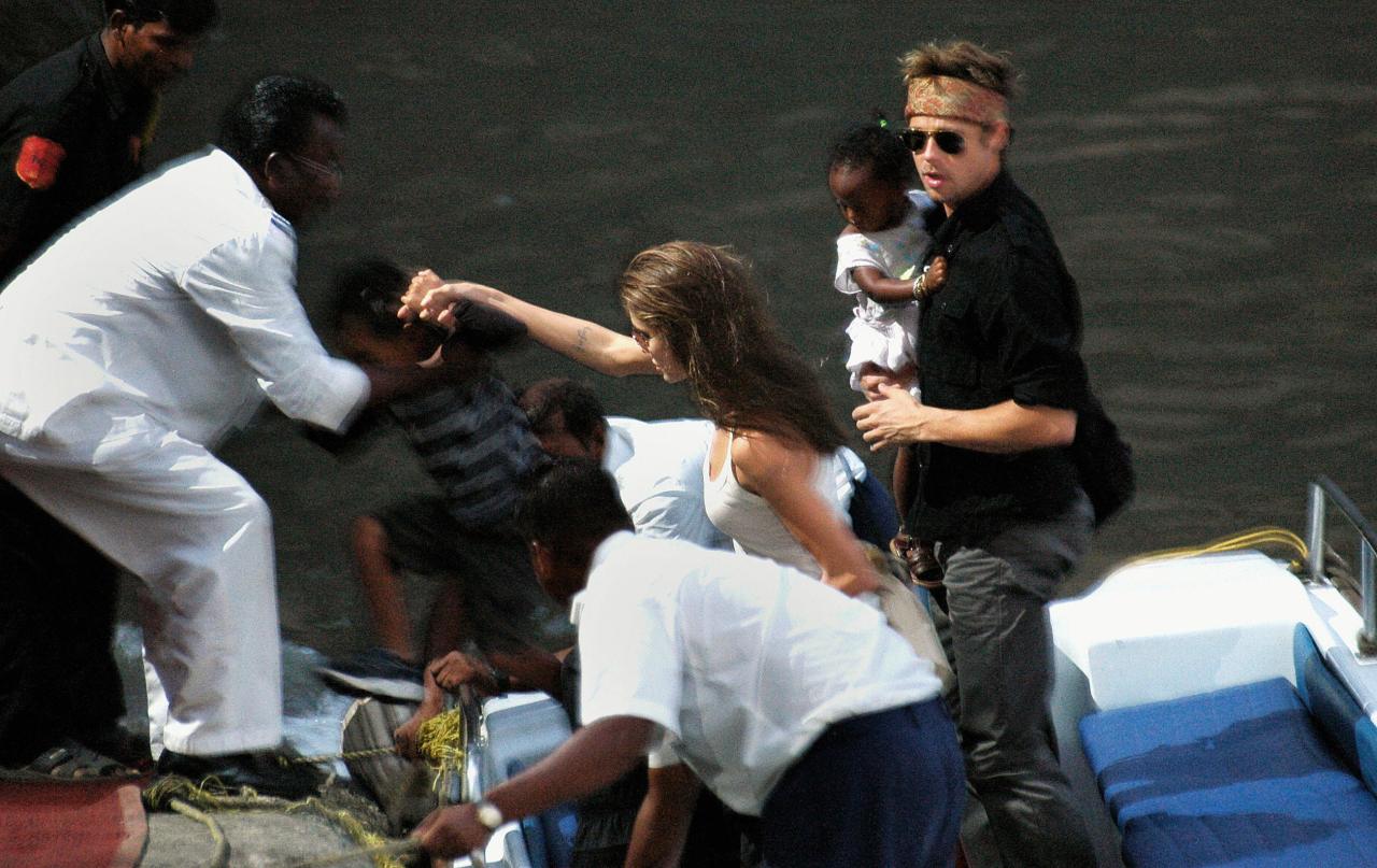 Brad Pitt and Angelina Jolie with their children Maddox and Zahara at Elephanta Island near Mumbai in 2006