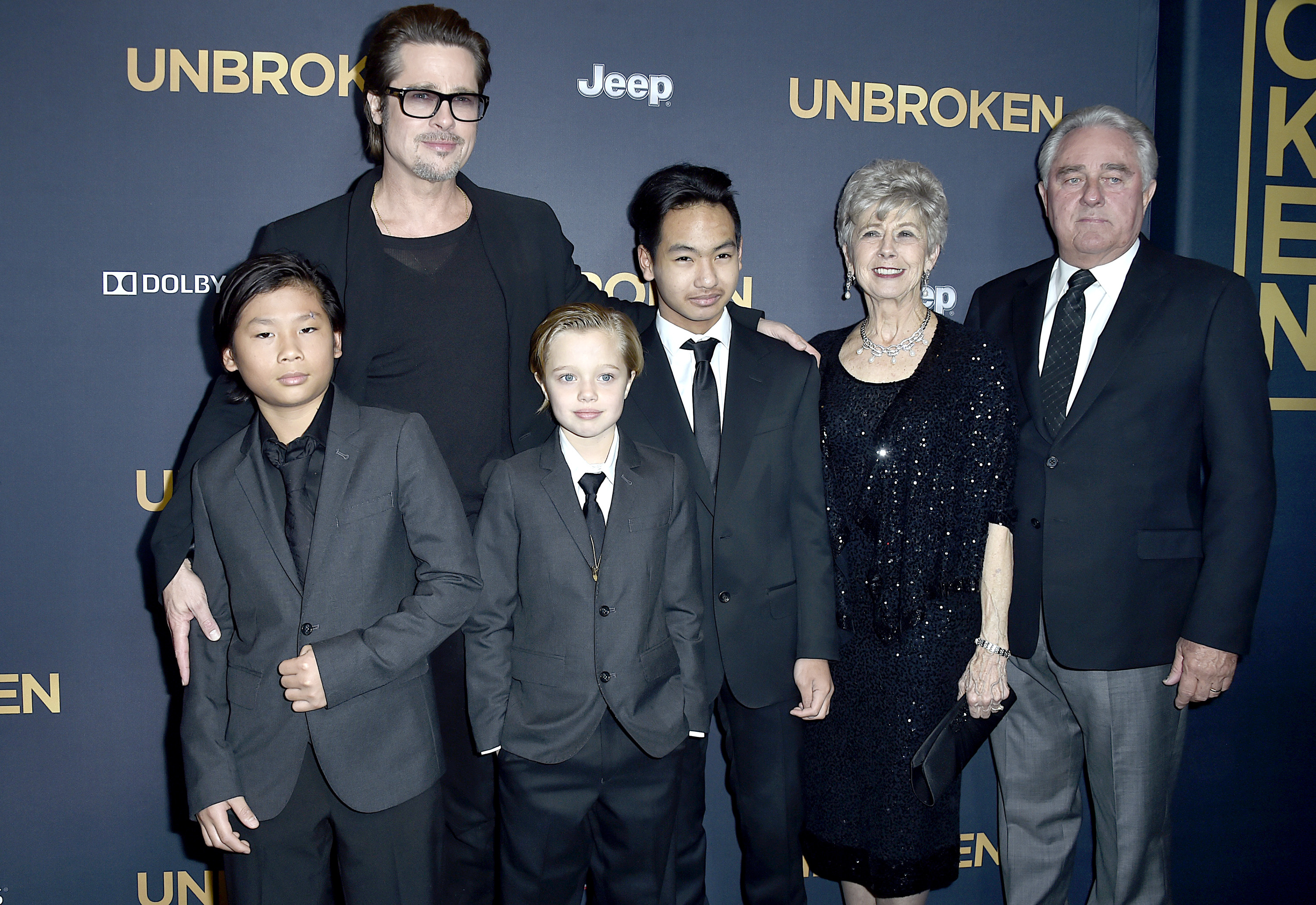 Brad Pitt with children Pax, Shiloh, and Maddox Jolie-Pitt and his parents Jane and William Pitt at the Unbroken premiere in Hollywood