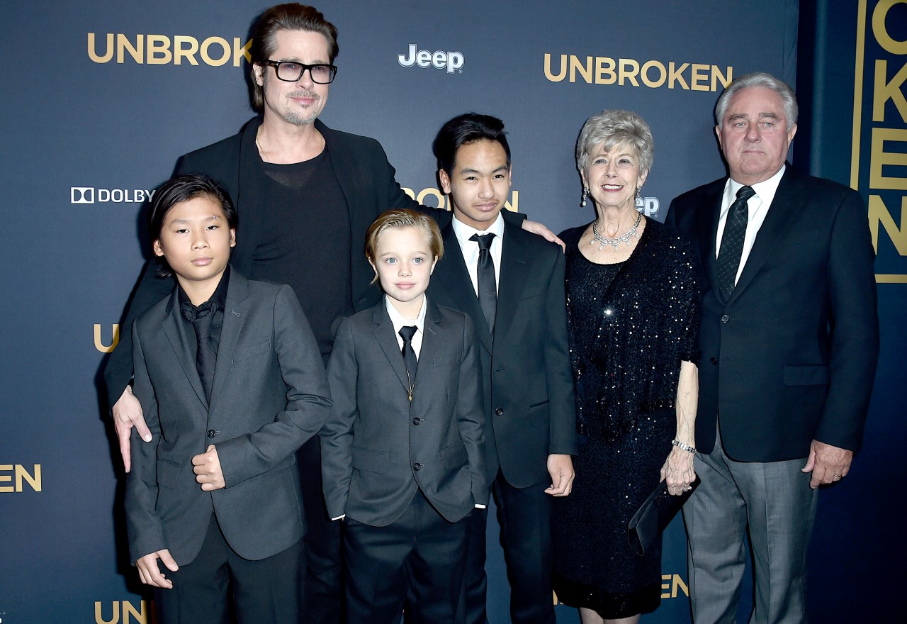Brad Pitt with children Pax, Shiloh, and Maddox Jolie-Pitt and his parents Jane and William Pitt at the Unbroken premiere in Hollywood