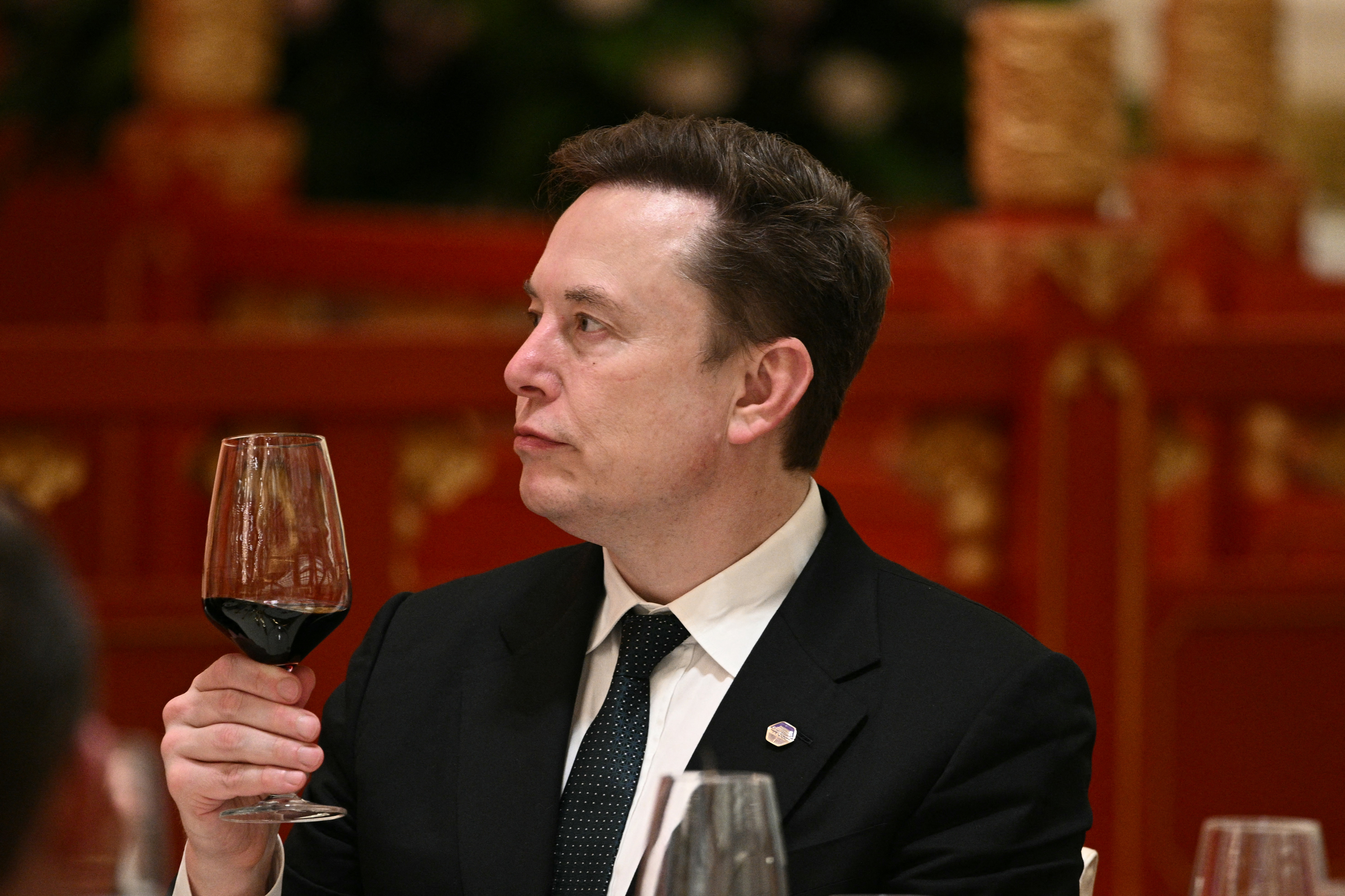 Elon Musk at a state banquet with Donald Trump and Xi Jinping at the Great Hall of the People in Beijing