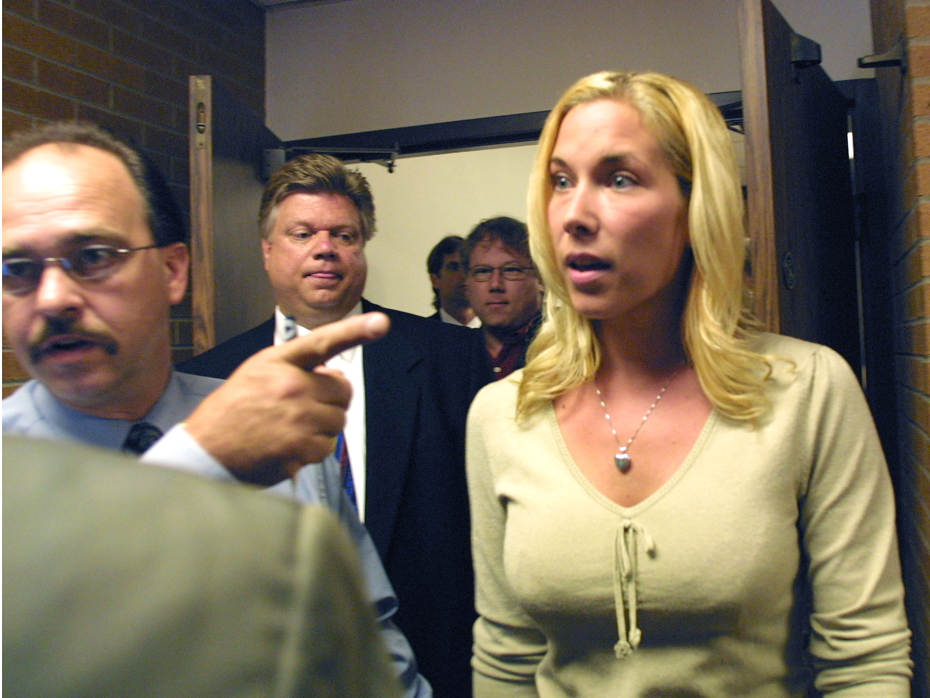Kim Mathers leaving a Michigan district courthouse after her arraignment in July 2003