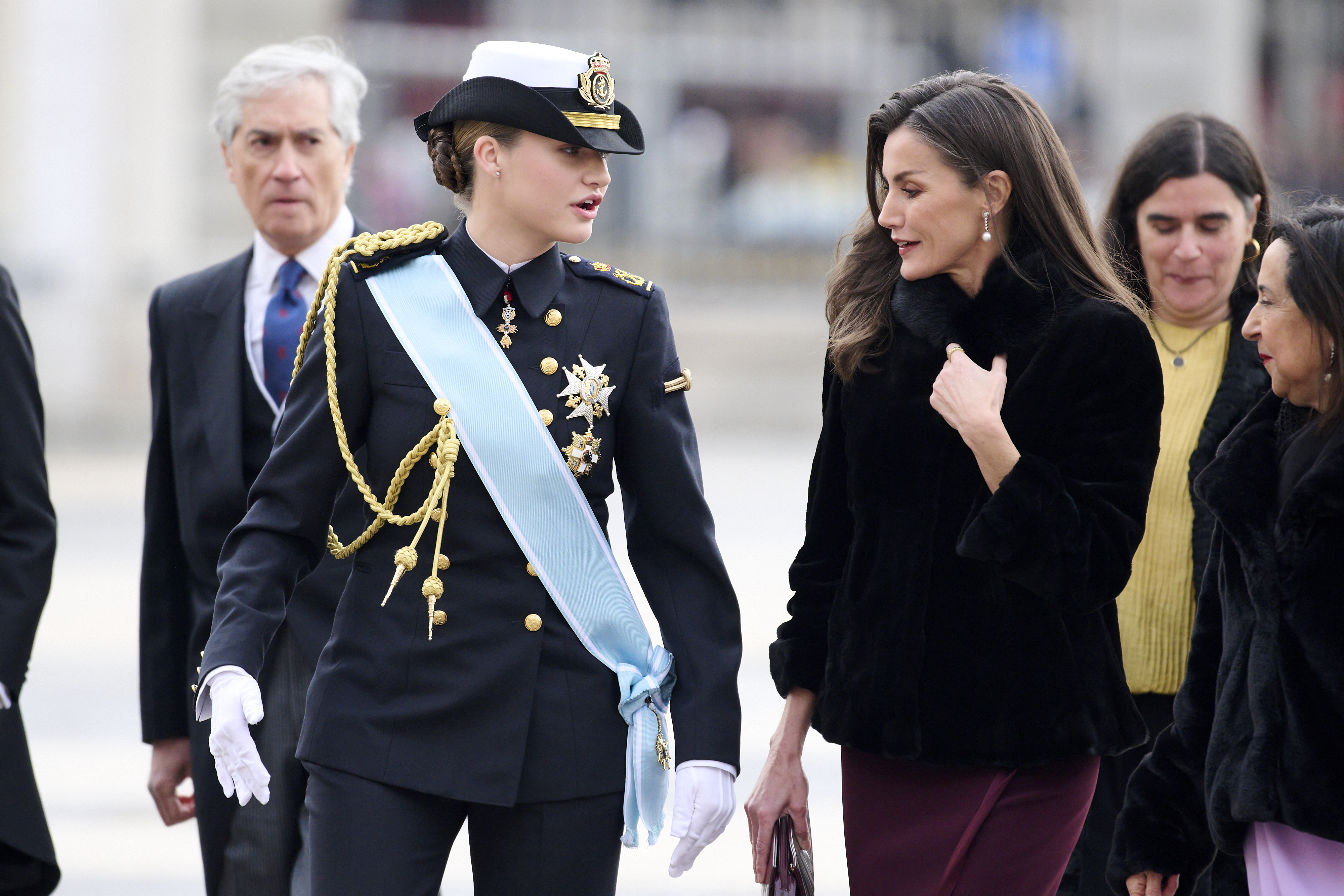 Crown Princess Leonor and Queen Letizia of Spain standing together at the Pascua Militar ceremony at the Royal Palace in Madrid.