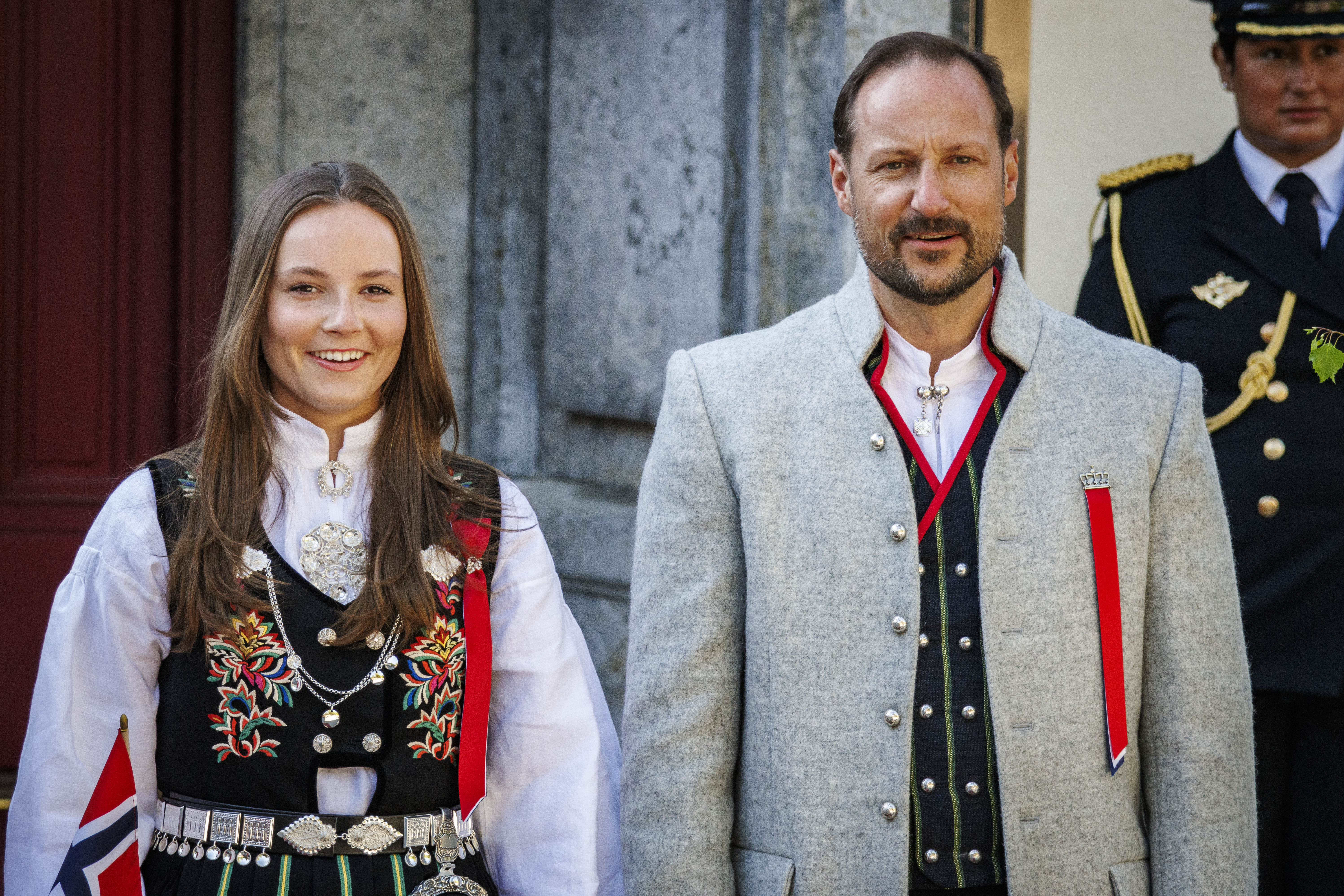 Crown Prince Haakon Magnus and Princess Ingrid Alexandra greeting a children's parade at Skaugum on Norwegian National Day 2024