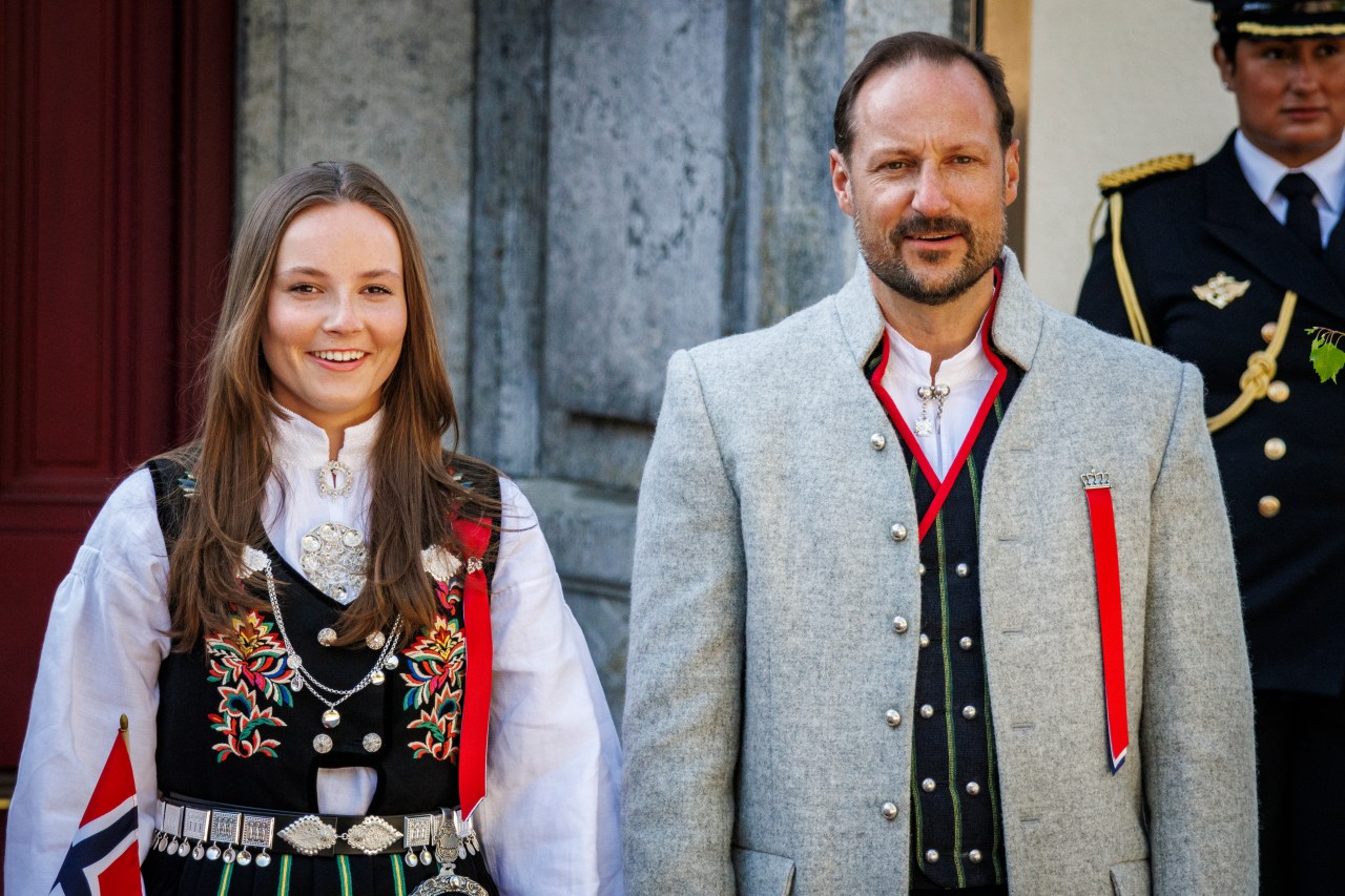 Crown Prince Haakon Magnus and Princess Ingrid Alexandra greeting a children's parade at Skaugum on Norwegian National Day 2024