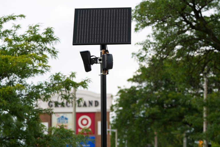 Flock Safety license plate reader cameras installed at the entrance of the Graceland shopping center in Columbus