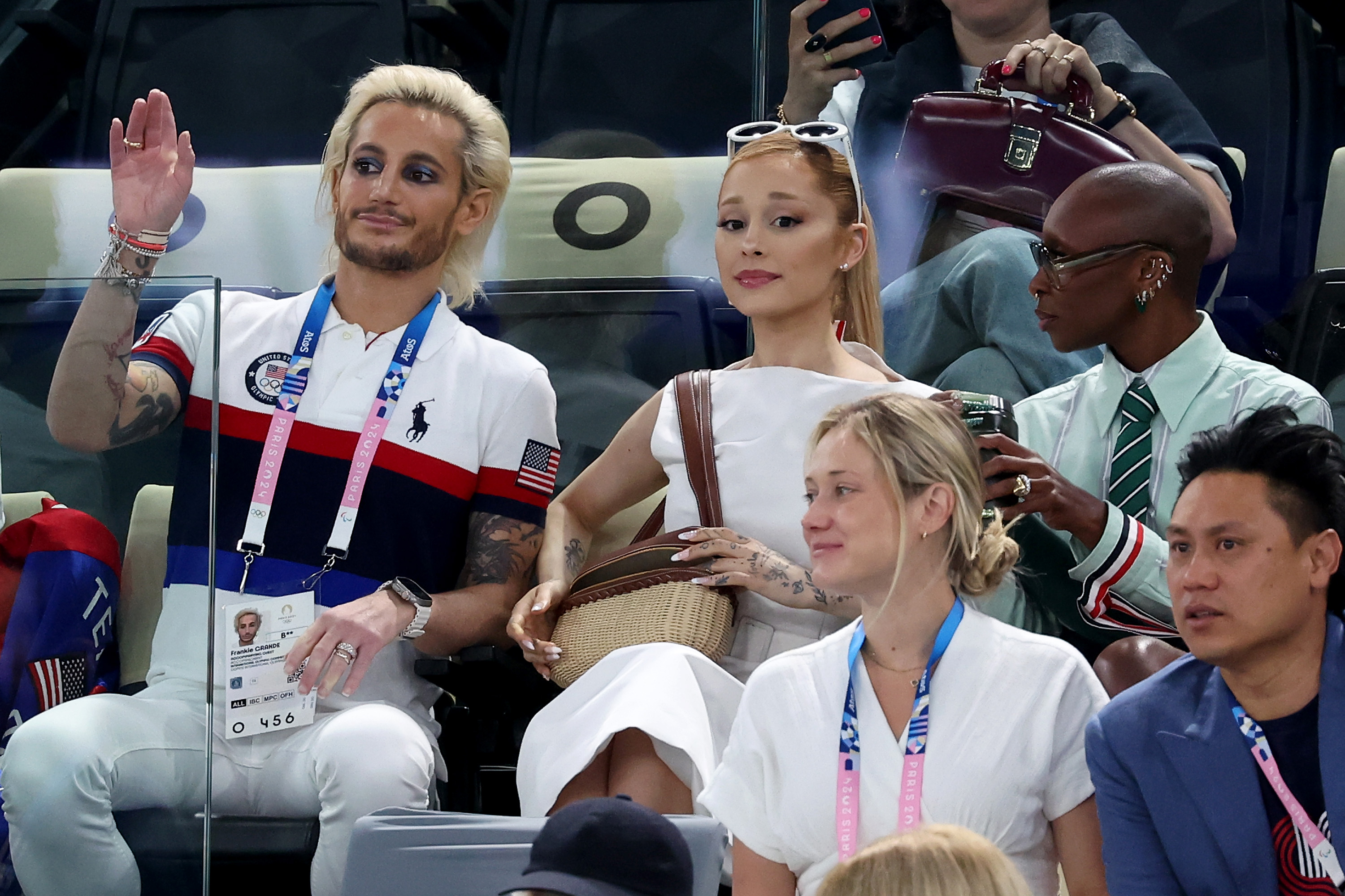 Frankie Grande, Ariana Grande, and Cynthia Erivo seated together at the Paris 2024 Olympics artistic gymnastics event