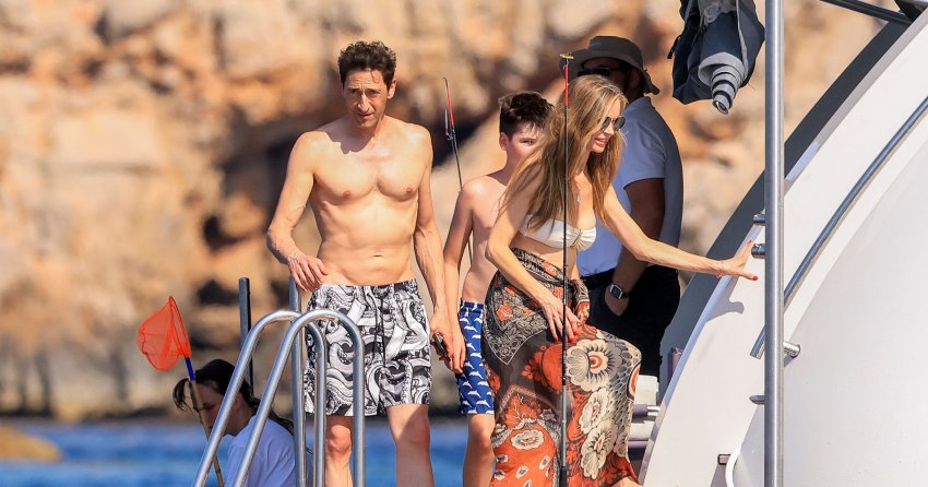 Harvey Weinstein Said from Prison He’s “Happy” His Ex-Wife Found Love with Adrien Brody. She’s Now Vacationing with Him in Ibiza, and the Kids Call Him “Popsy”